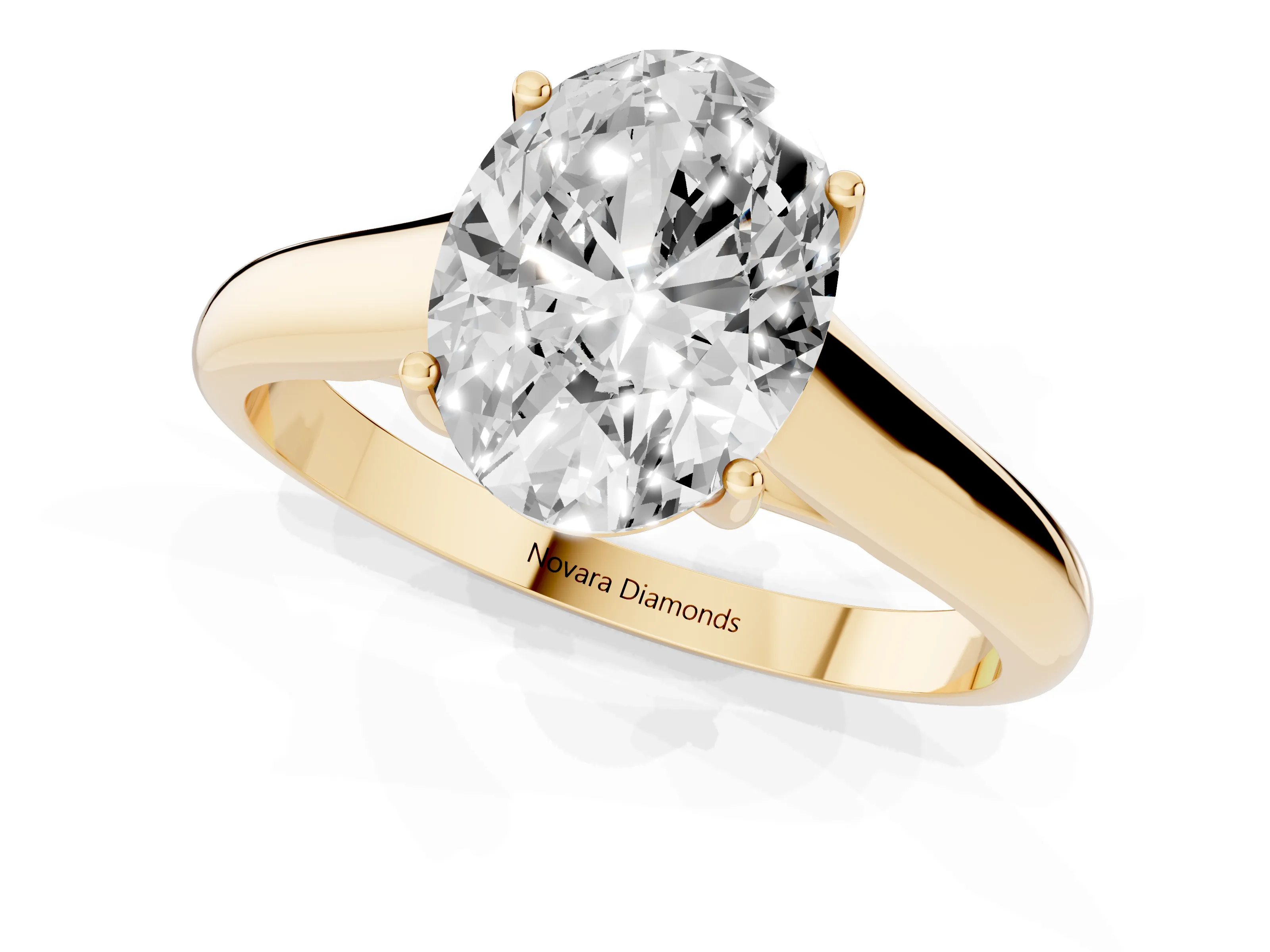 Oval Cut Diamond Solitaire Engagement Ring Set in Yellow gold with Subtly Tapered Band and Prong Setting