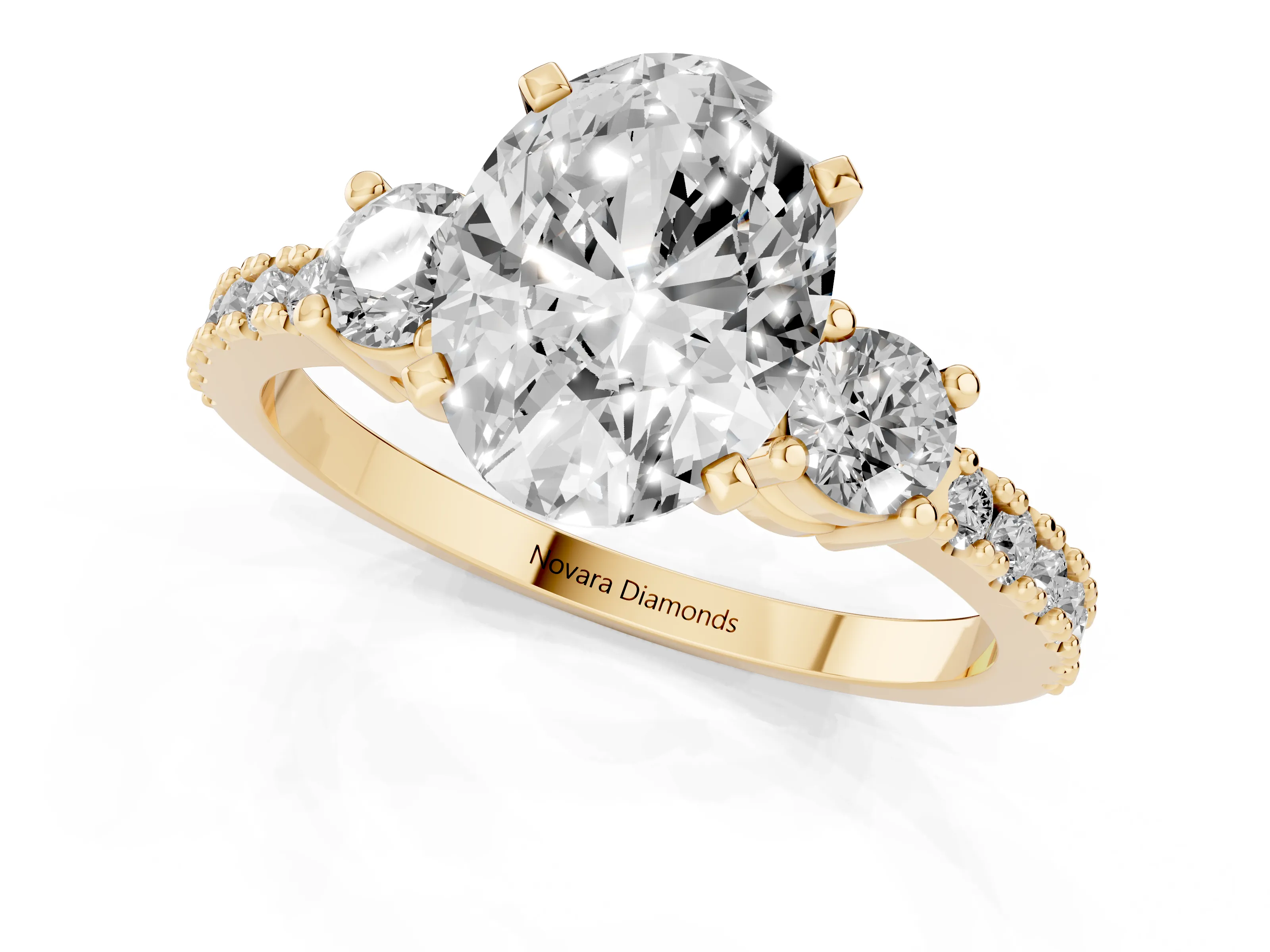 Three-Stone Oval Cut Diamond Pavé Band Ring Set in Yellow gold with Prong Setting