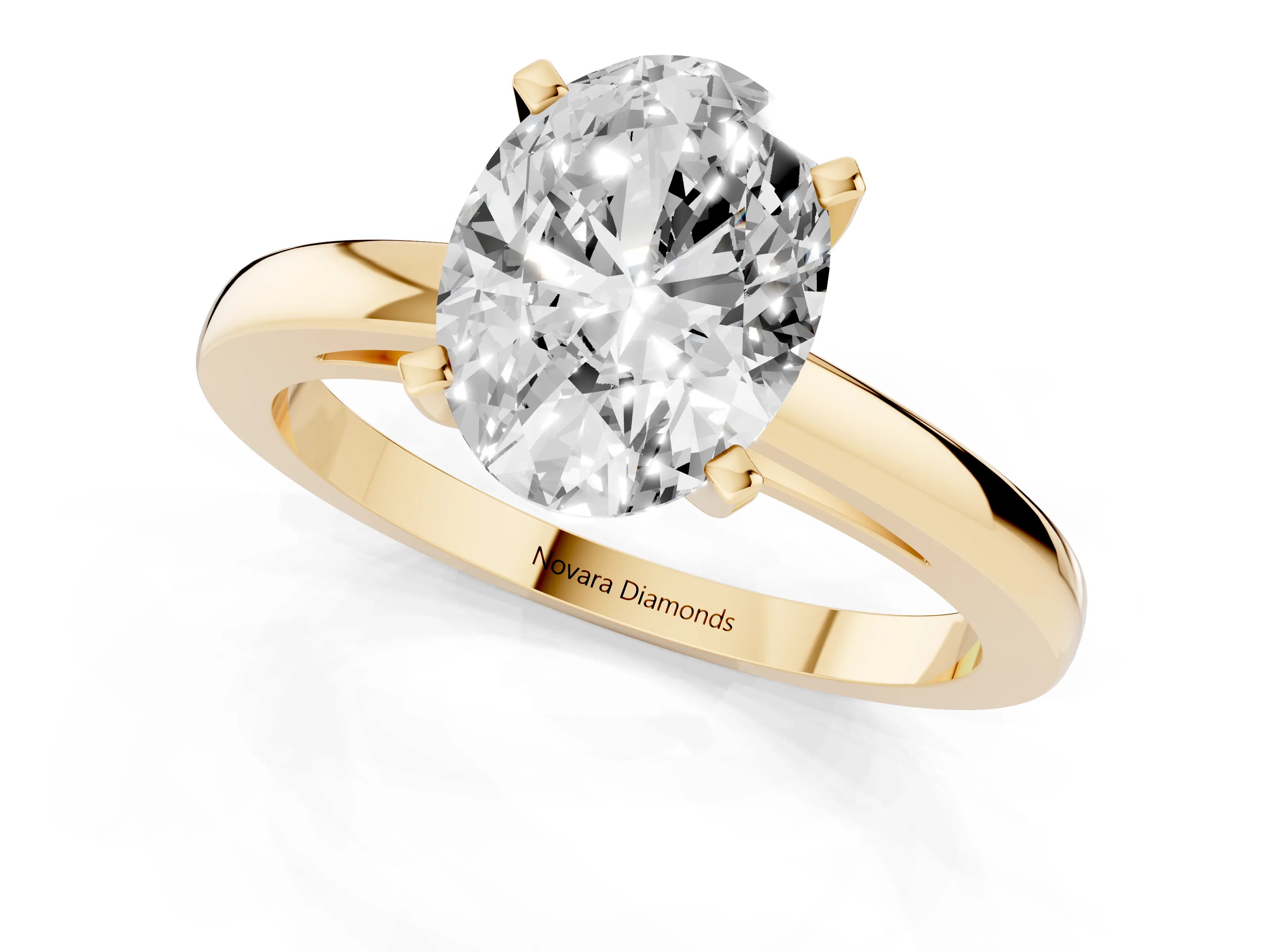 Oval Cut Diamond Solitaire Engagement Ring Set in Yellow gold with Prong Setting on a Classic Band