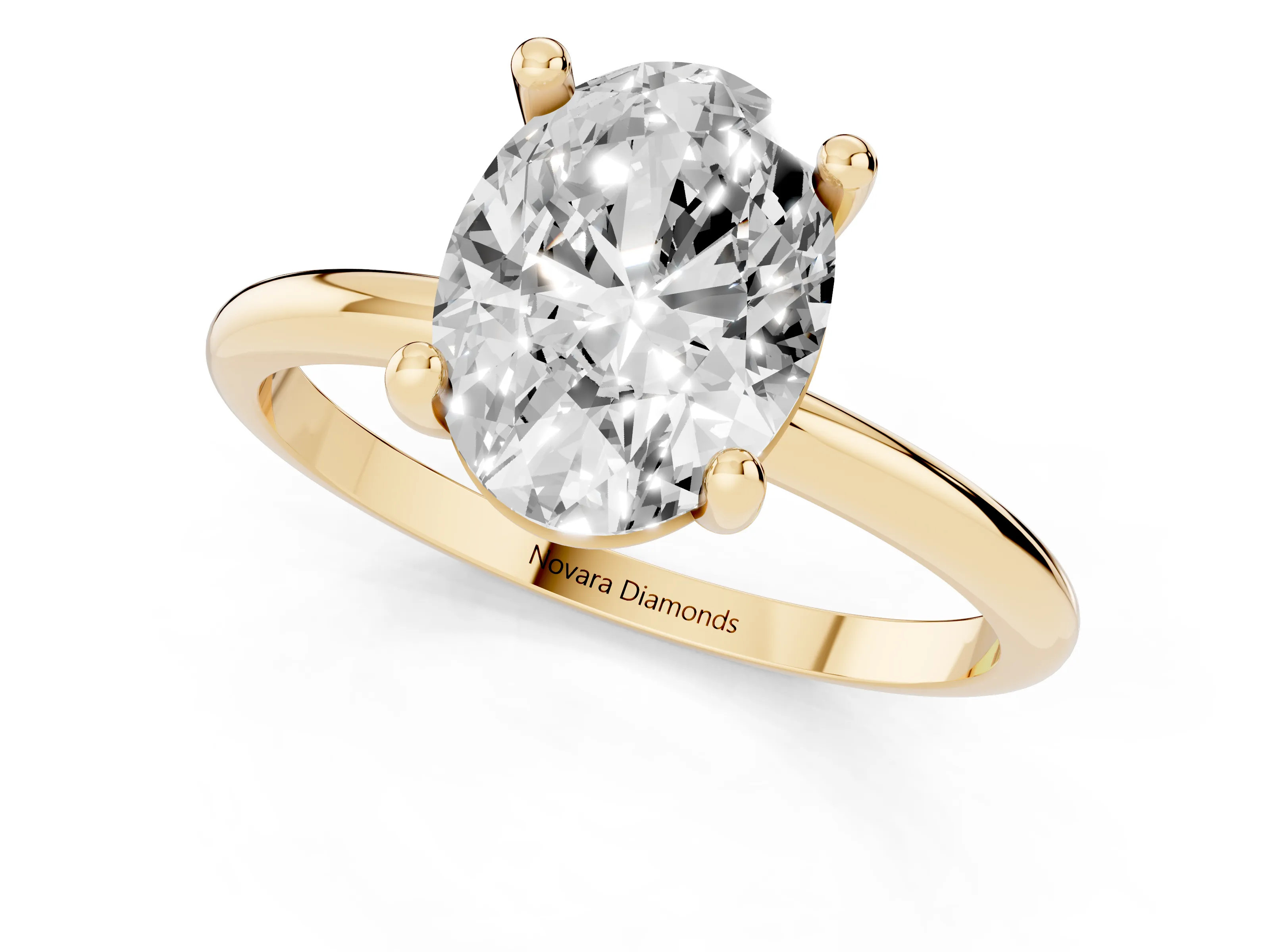 Oval Cut Diamond Solitaire Ring Set in Yellow gold with Secure Prong Setting on a Classic Band