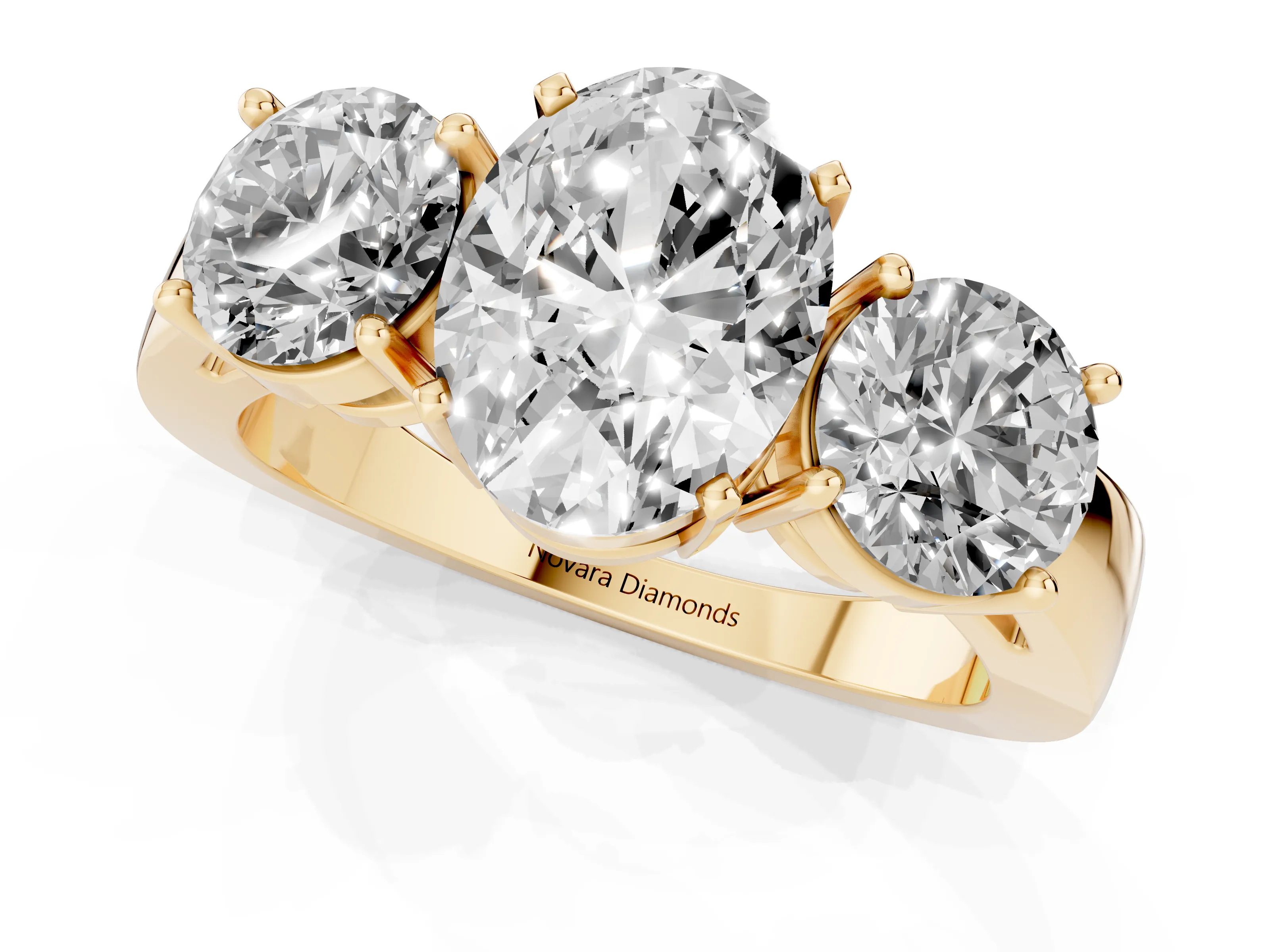 Oval Cut Diamond Three-Stone Ring Set in Yellow gold with Round Side Stones and Classic Band