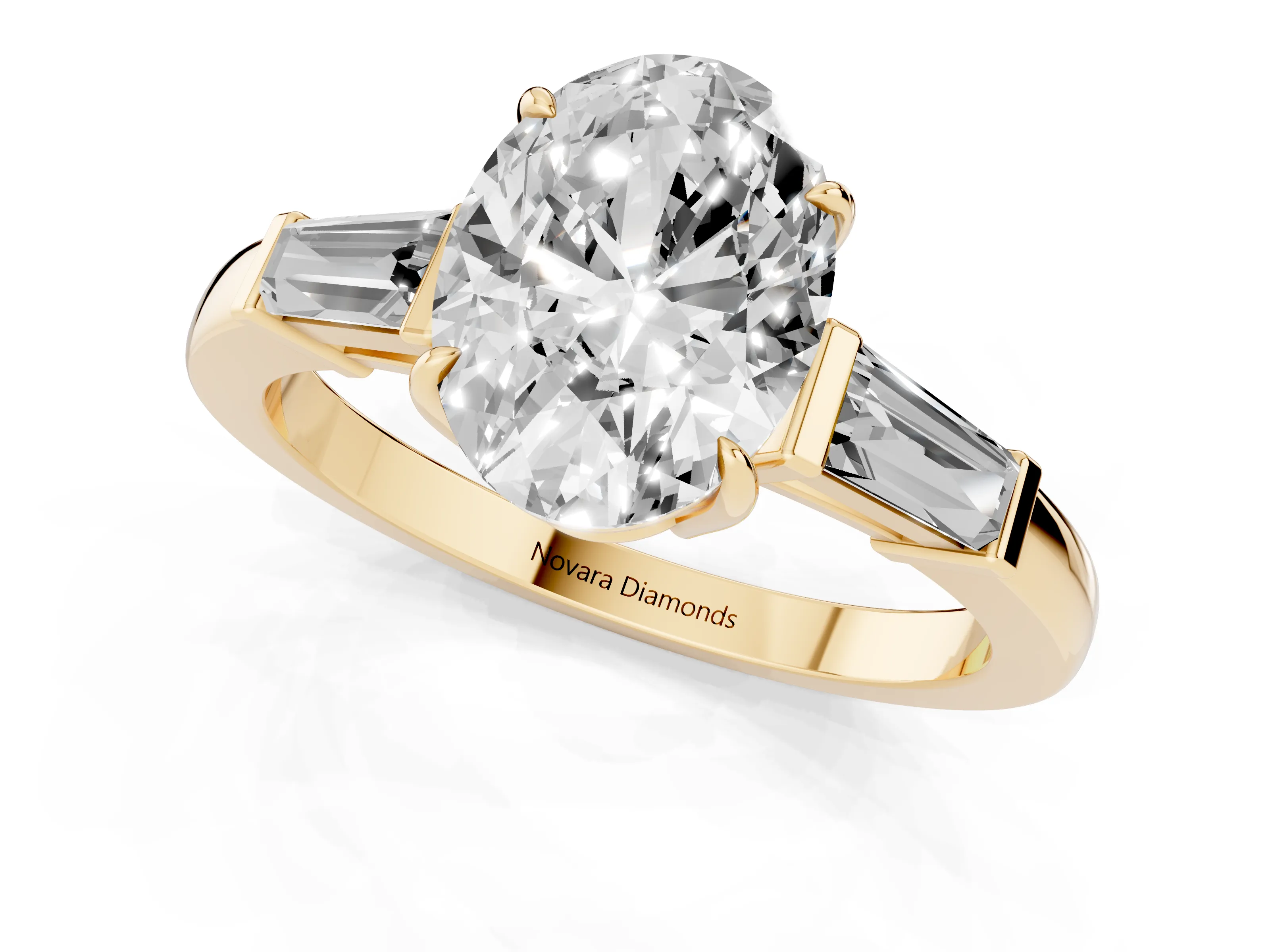 Oval Cut Diamond Three-Stone Ring Set in Yellow gold with Tapered Baguette Side Stones and Prong Setting