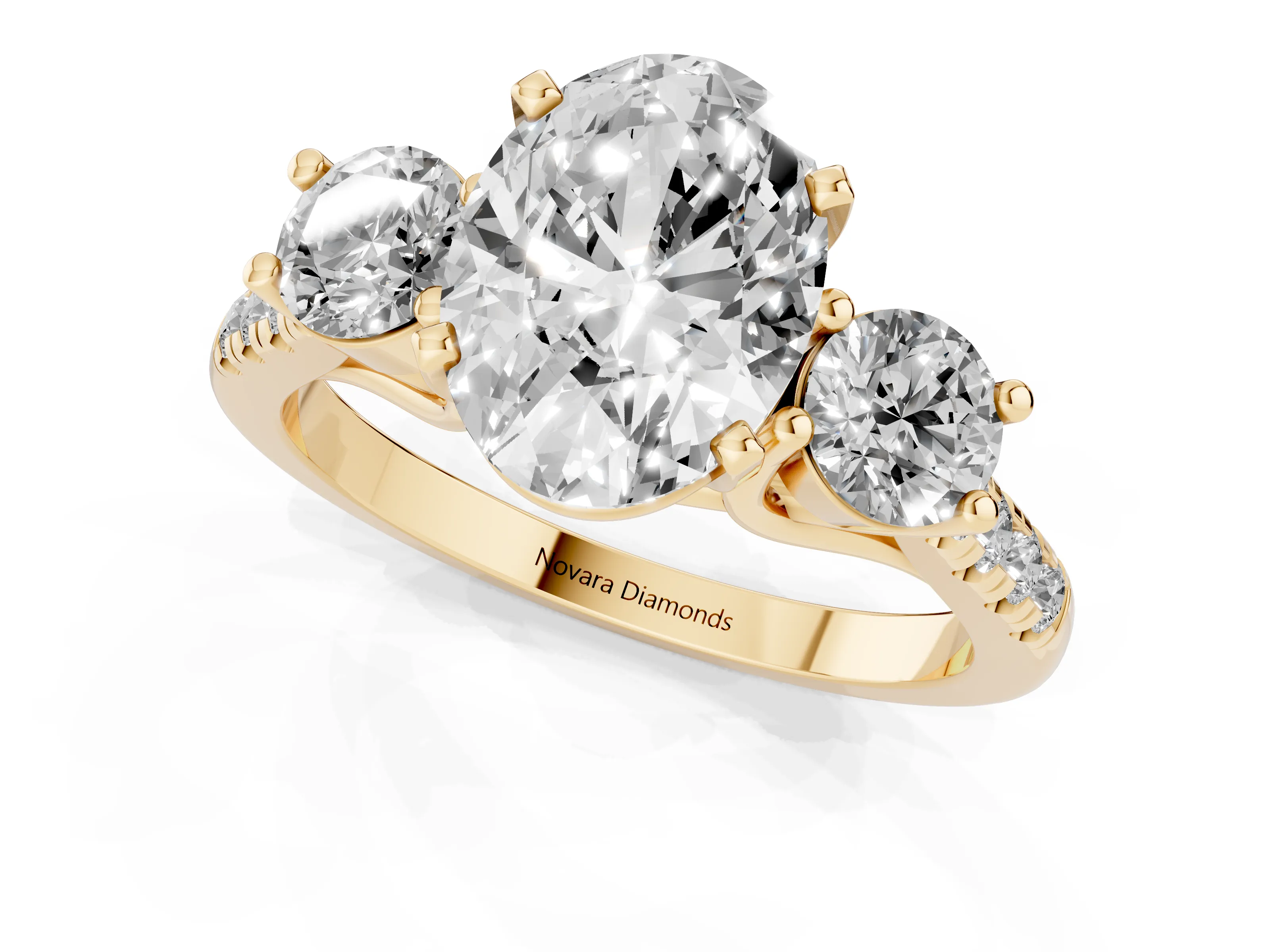 Three-Stone Oval Cut Diamond Pavé Band Ring Set in Yellow gold with Prong-Set Trio