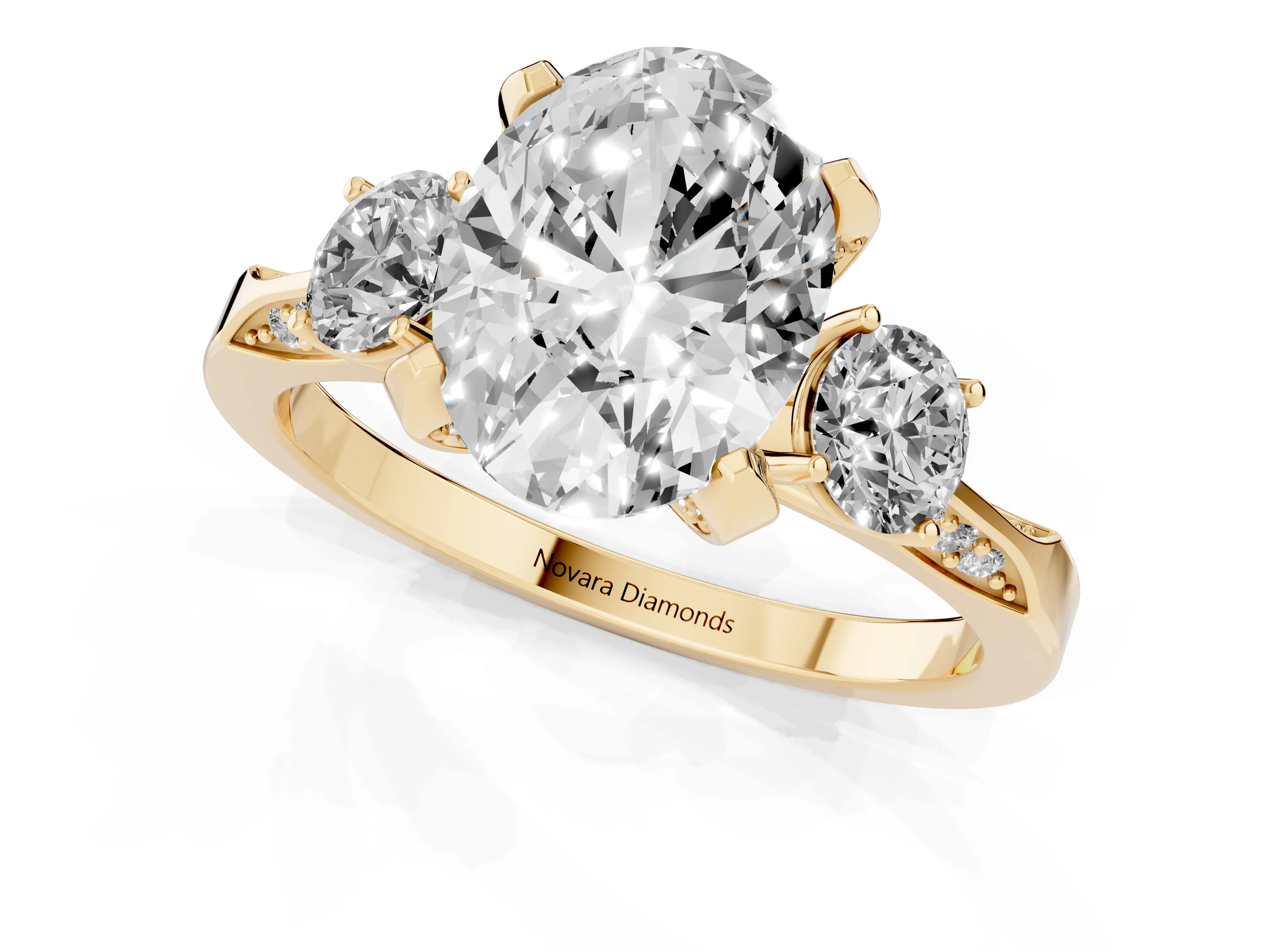 Oval Cut Diamond Three-Stone Ring Set in Yellow gold with Pavé Band and Smaller Side Stones