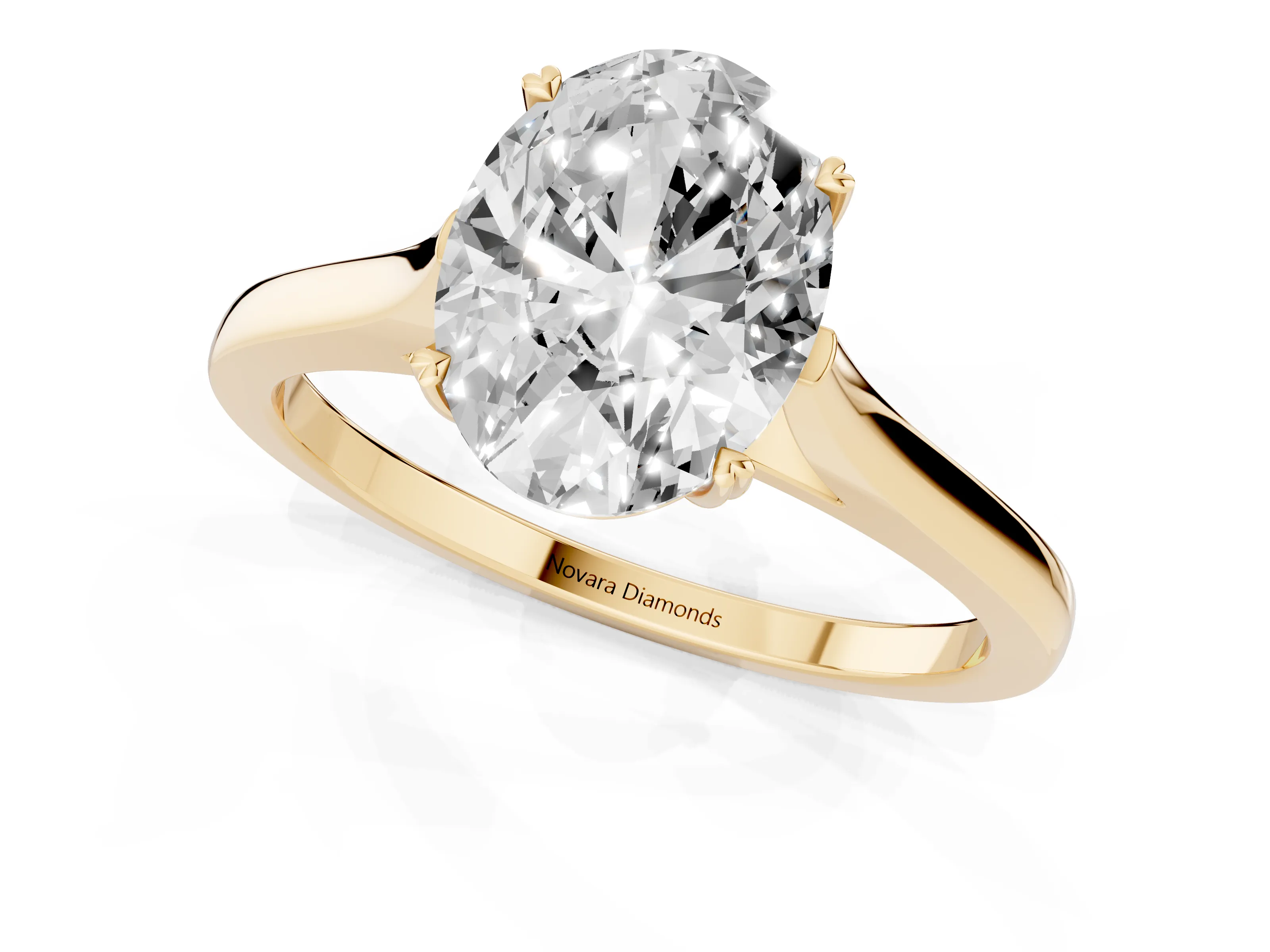 Oval Cut Diamond Solitaire Heart Prong Engagement Ring Set in Yellow gold with Tapered Band