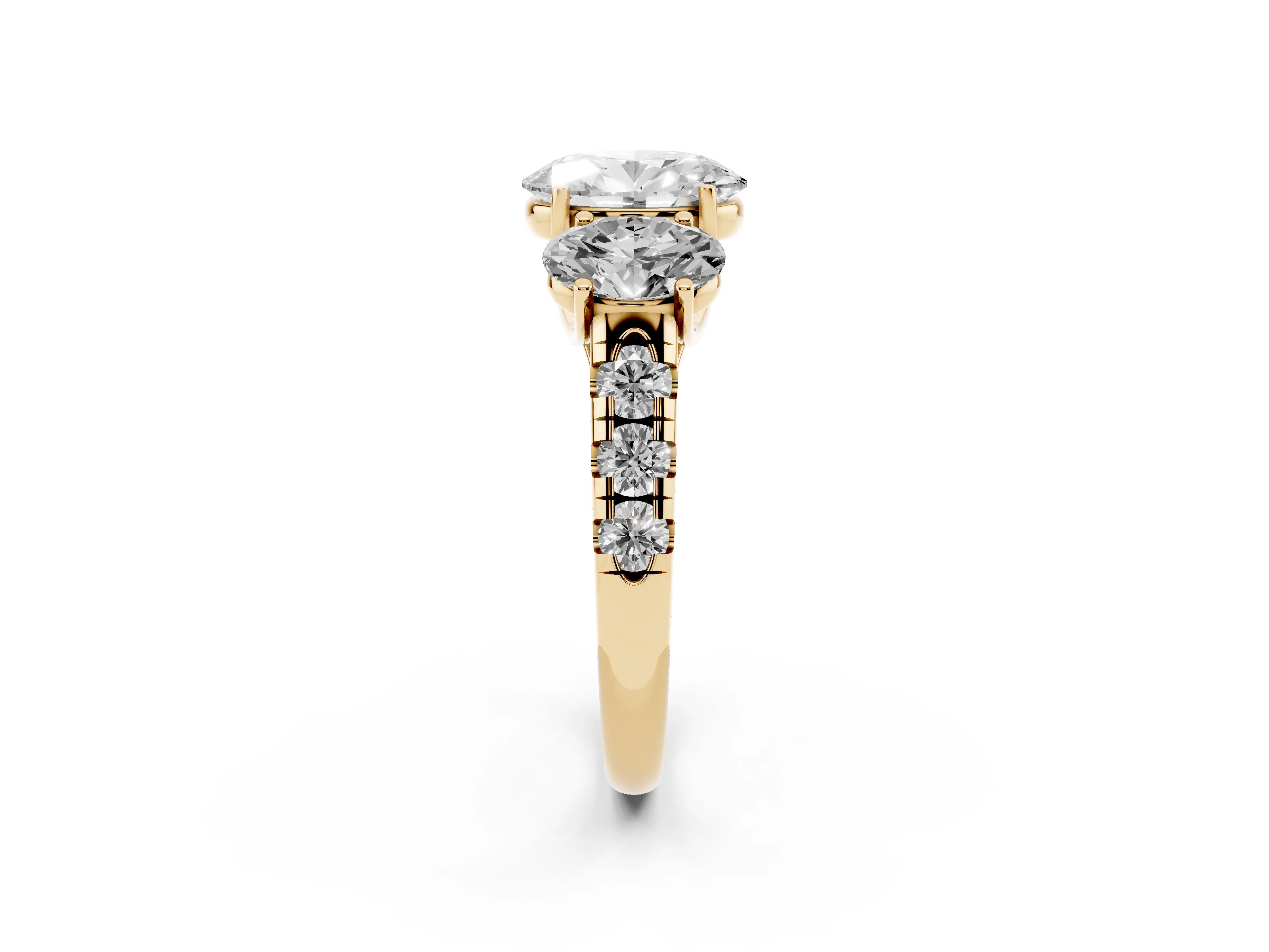 Oval Cut Diamond Three-Stone Ring Set in Yellow gold with Pavé Band