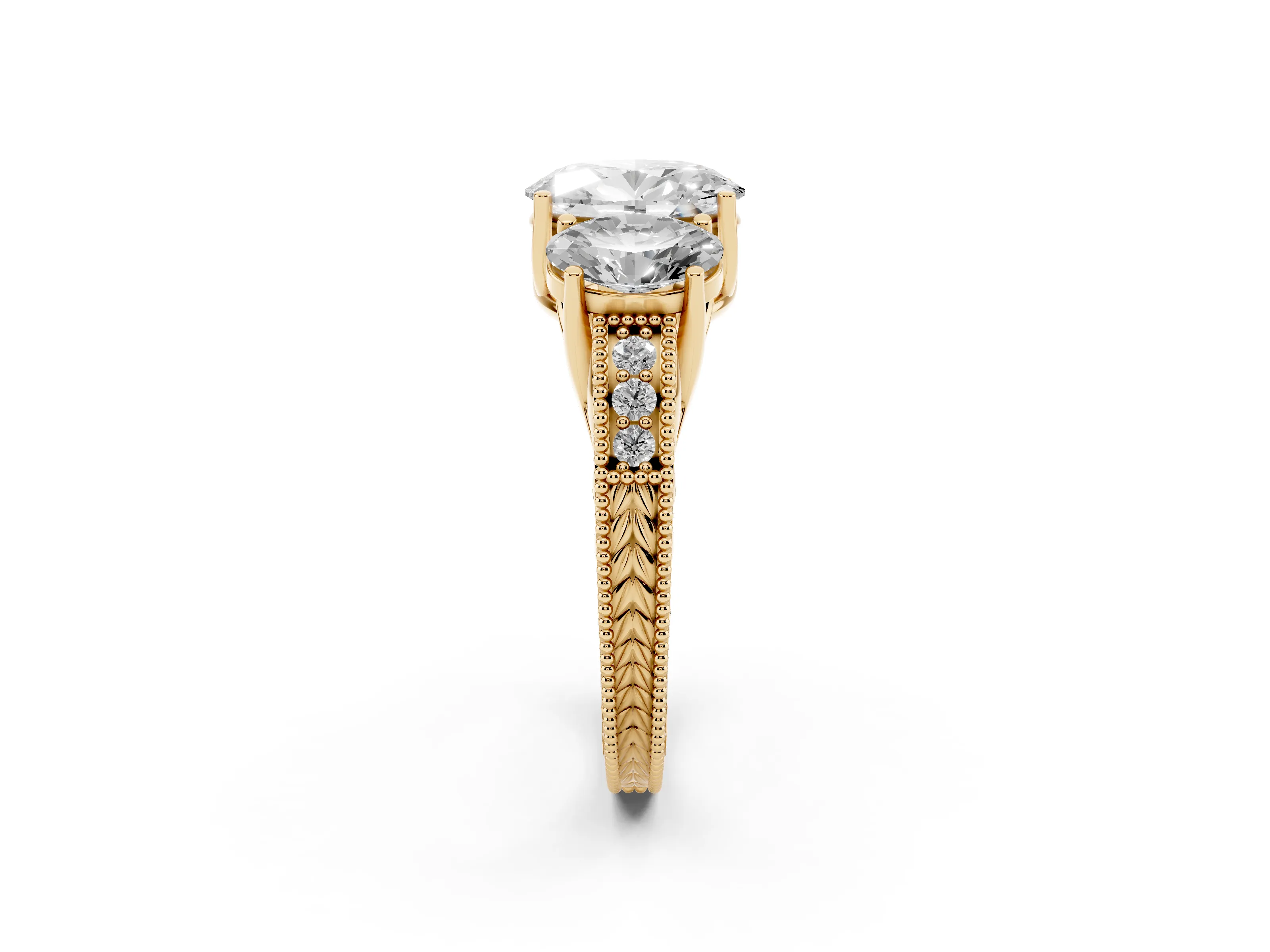 Oval Cut Diamond Three-Stone Engagement Ring Set in Yellow gold with Milgrain Pavé Band