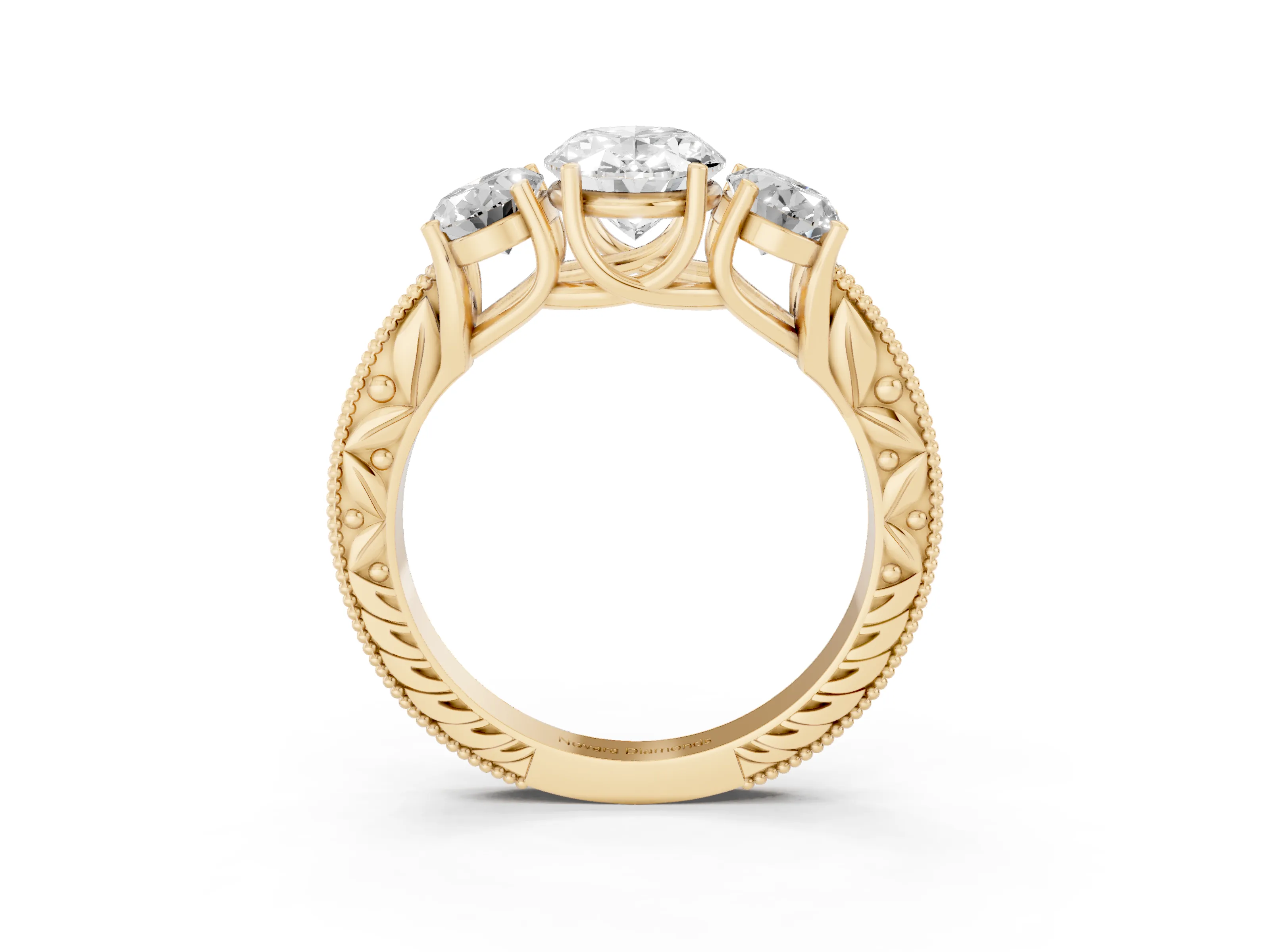 Oval Cut Diamond Three-Stone Engagement Ring Set in Yellow gold with Milgrain Pavé Band