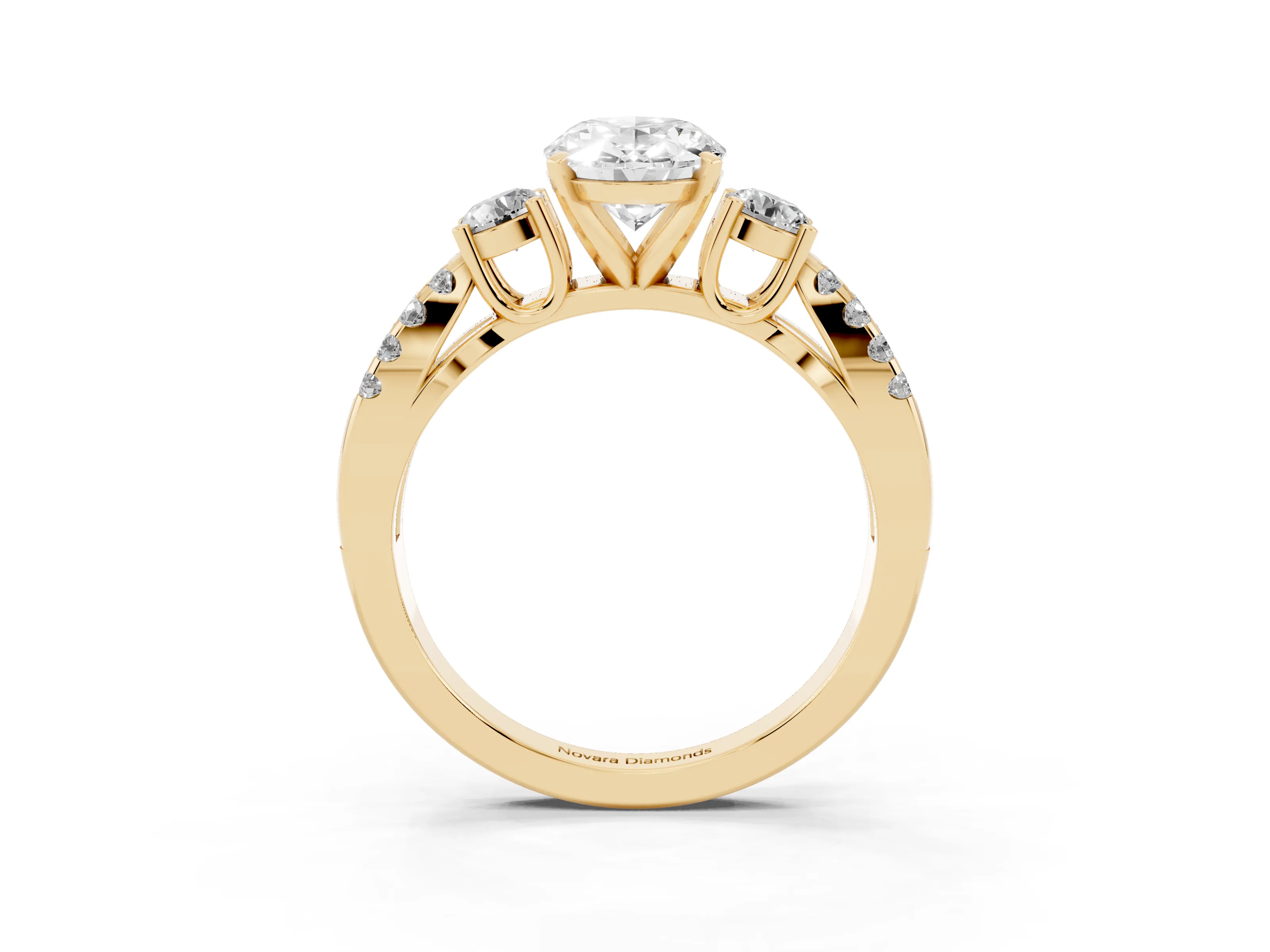 Oval Cut Diamond Three-Stone Ring Set in Yellow gold with Pavé Split Shank and Prong Setting