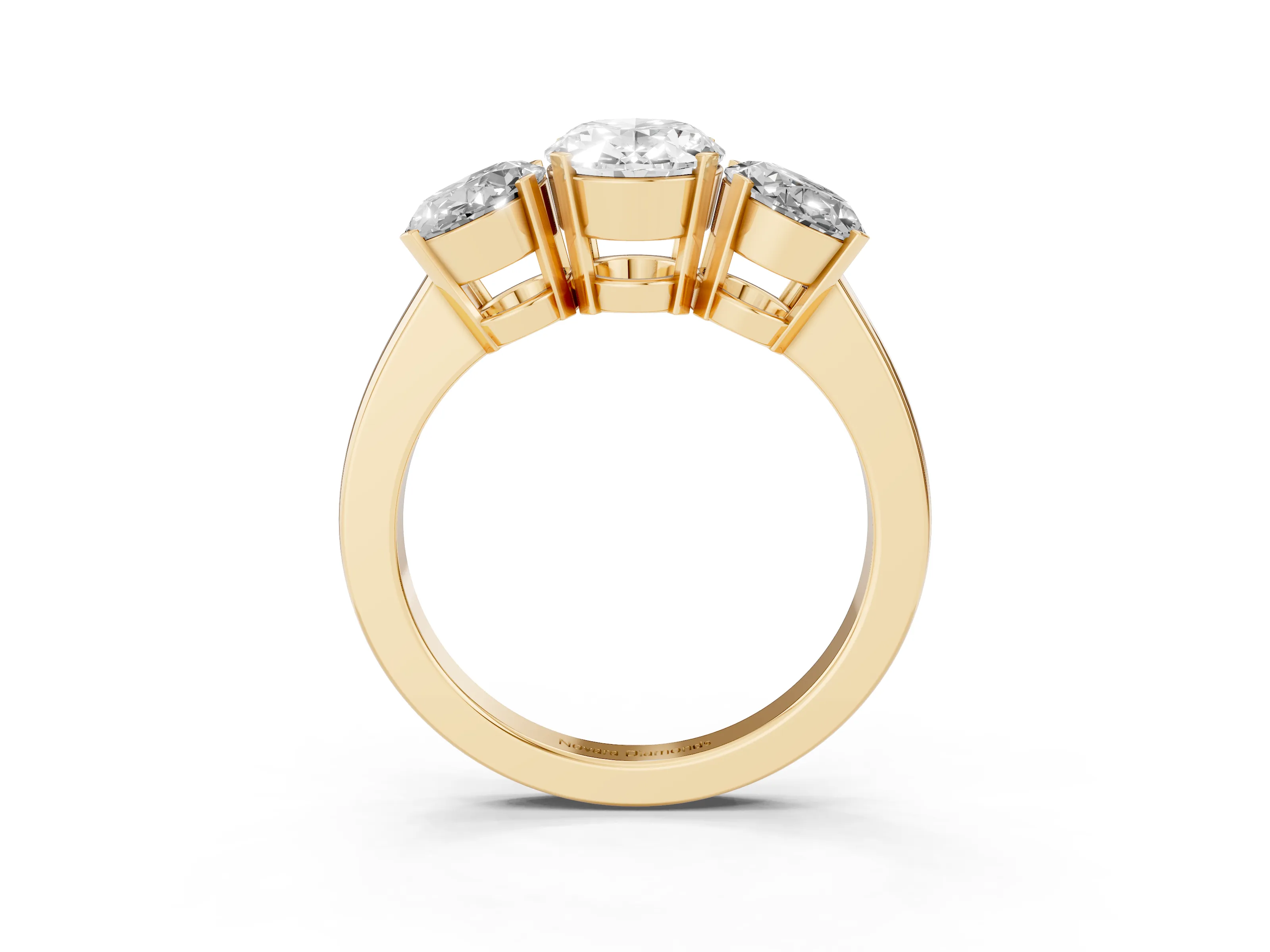 Oval Cut Diamond Three-Stone Ring Set in Yellow gold with Channel-Set Band and Prong Settings