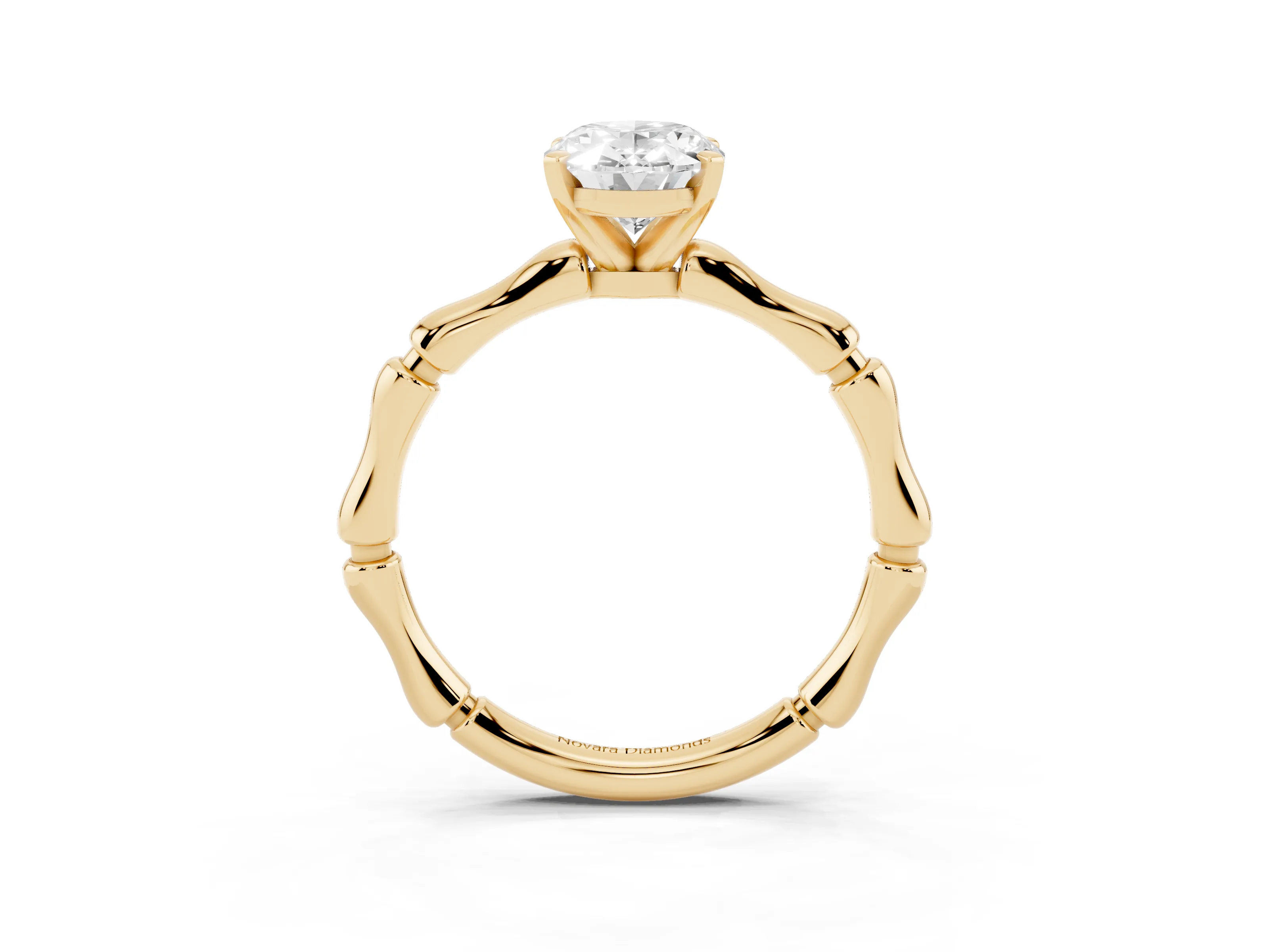 Oval Cut Diamond Solitaire Ring Set in Yellow gold with Bamboo Band and Prong Setting