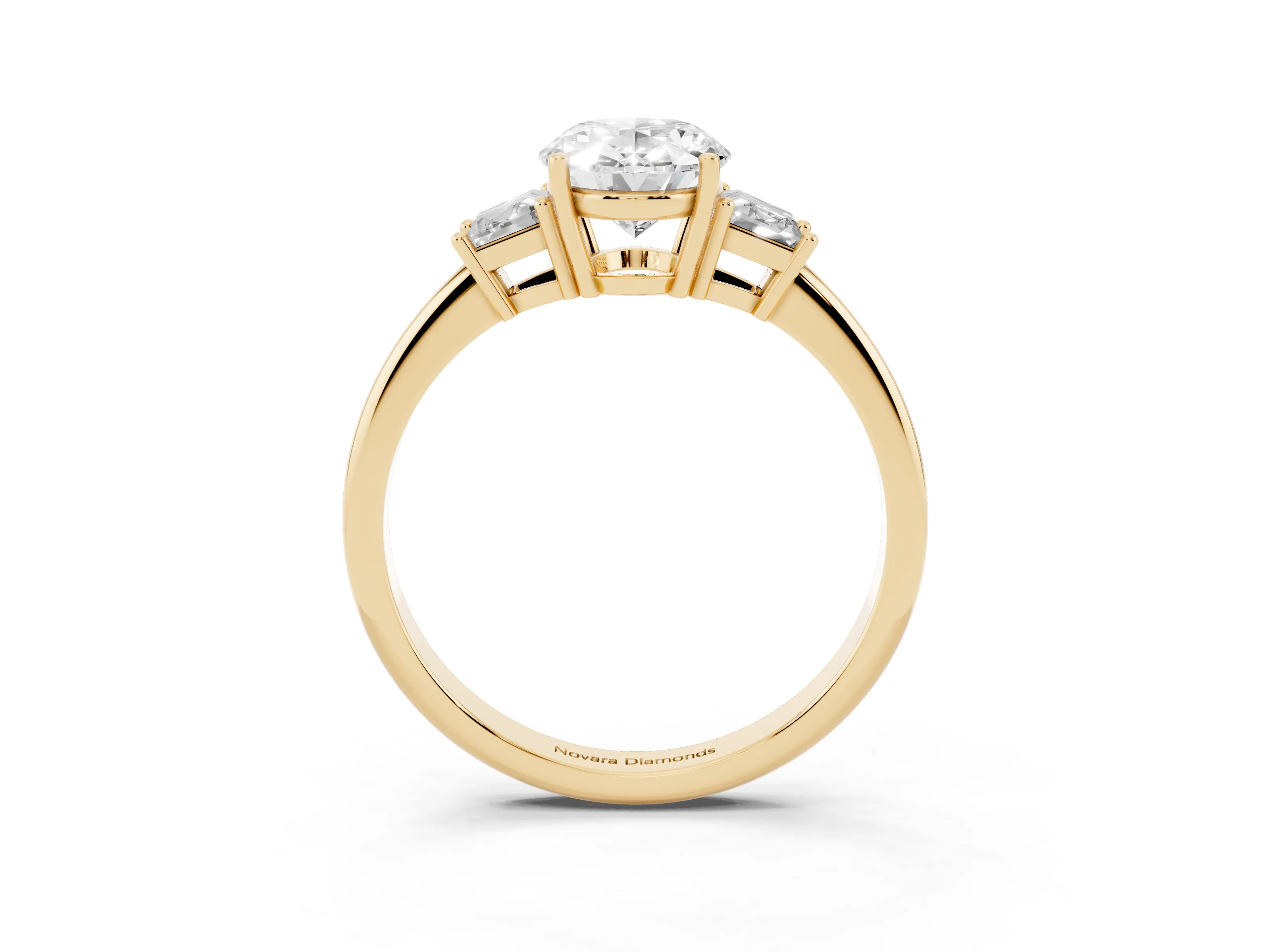 Oval Cut Diamond Three-Stone Ring Set in Yellow gold with Trapezoid Side Stones and Prong Setting