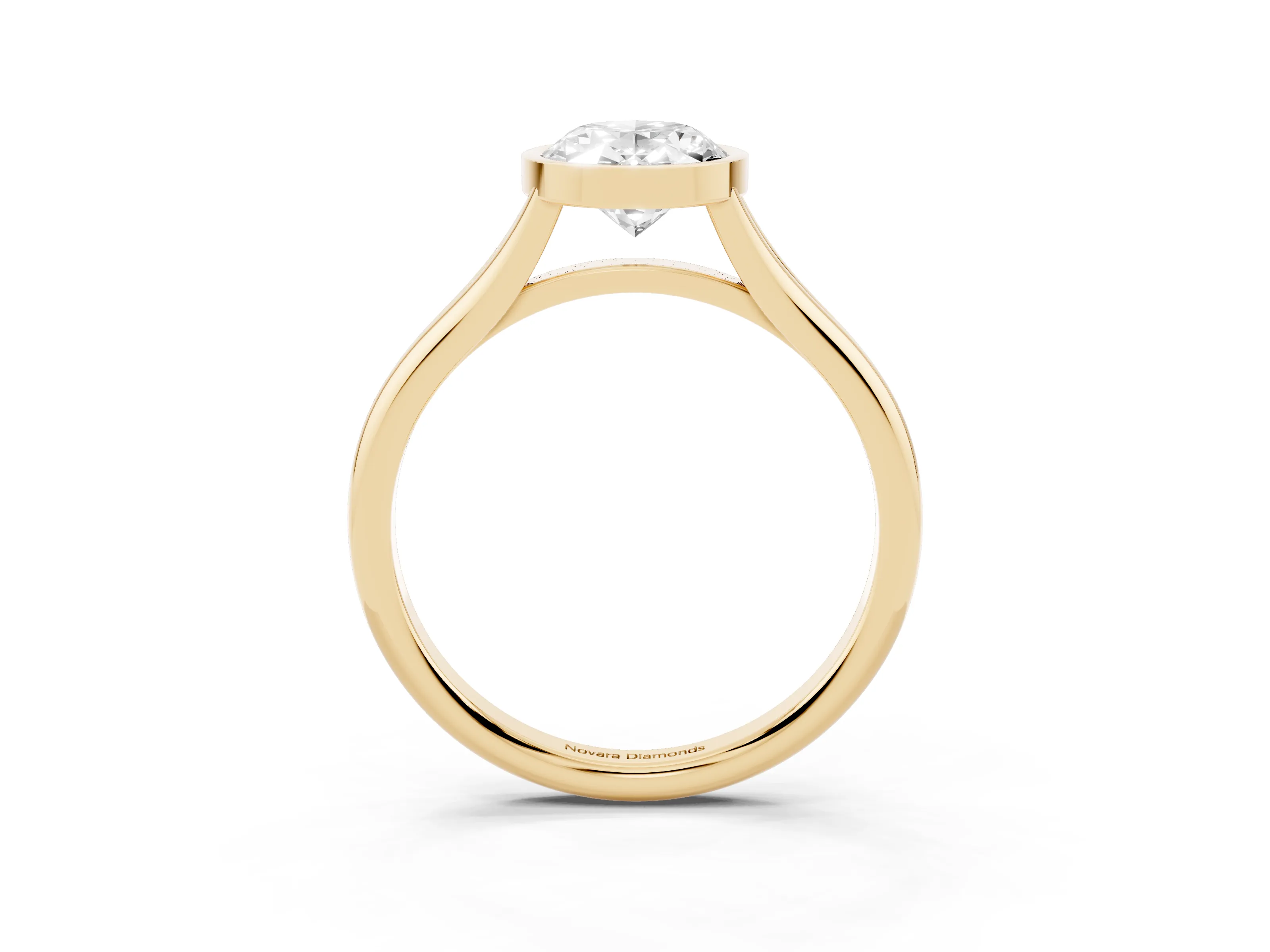 Bezel Set Oval Cut Diamond Solitaire Ring Set in Yellow gold with Tapered Band