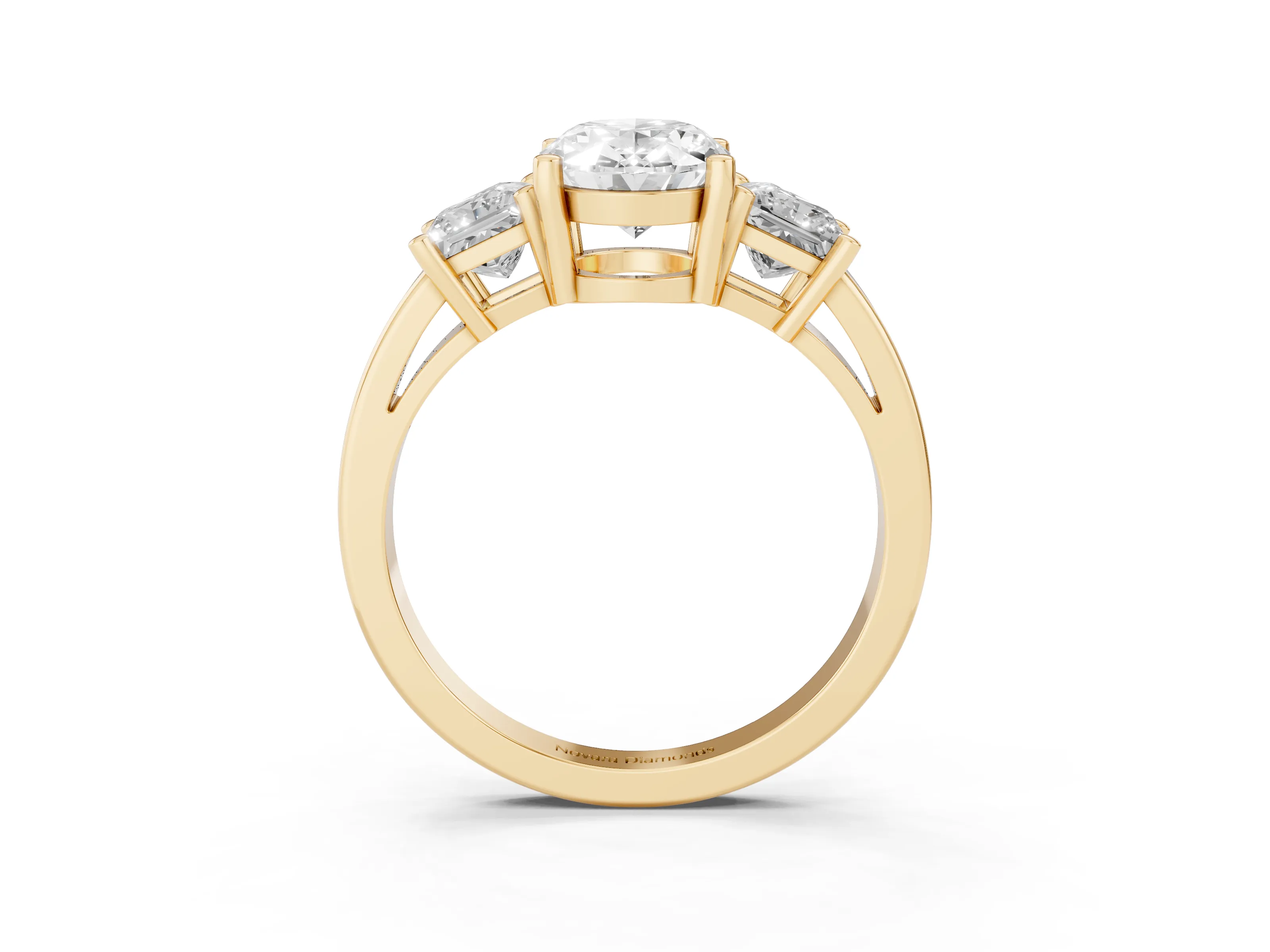 Three-Stone Oval Cut Diamond Solitaire Ring Set in Yellow gold with Prong Setting