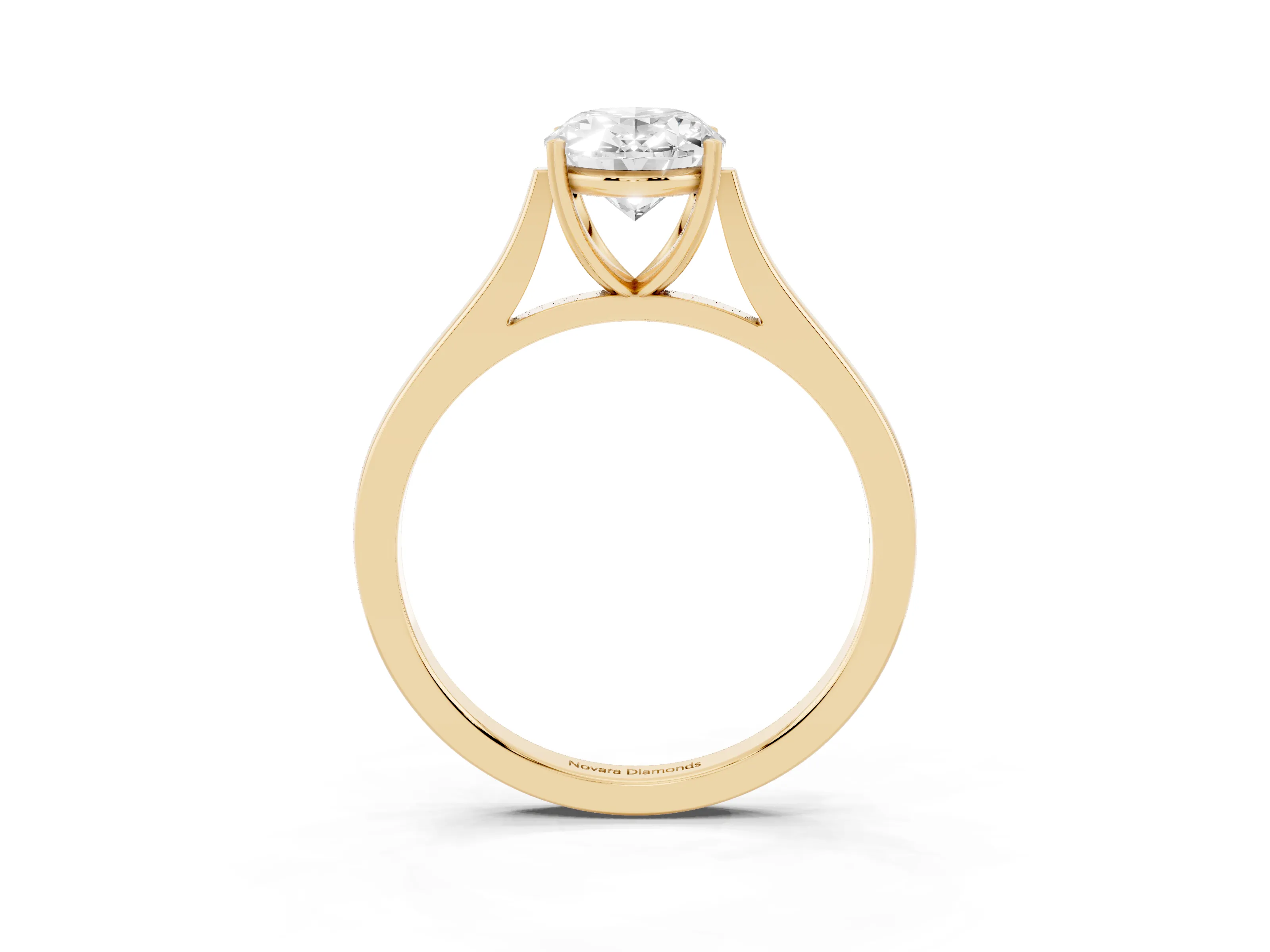 Oval Cut Diamond Solitaire Heart Prong Engagement Ring Set in Yellow gold with Tapered Band