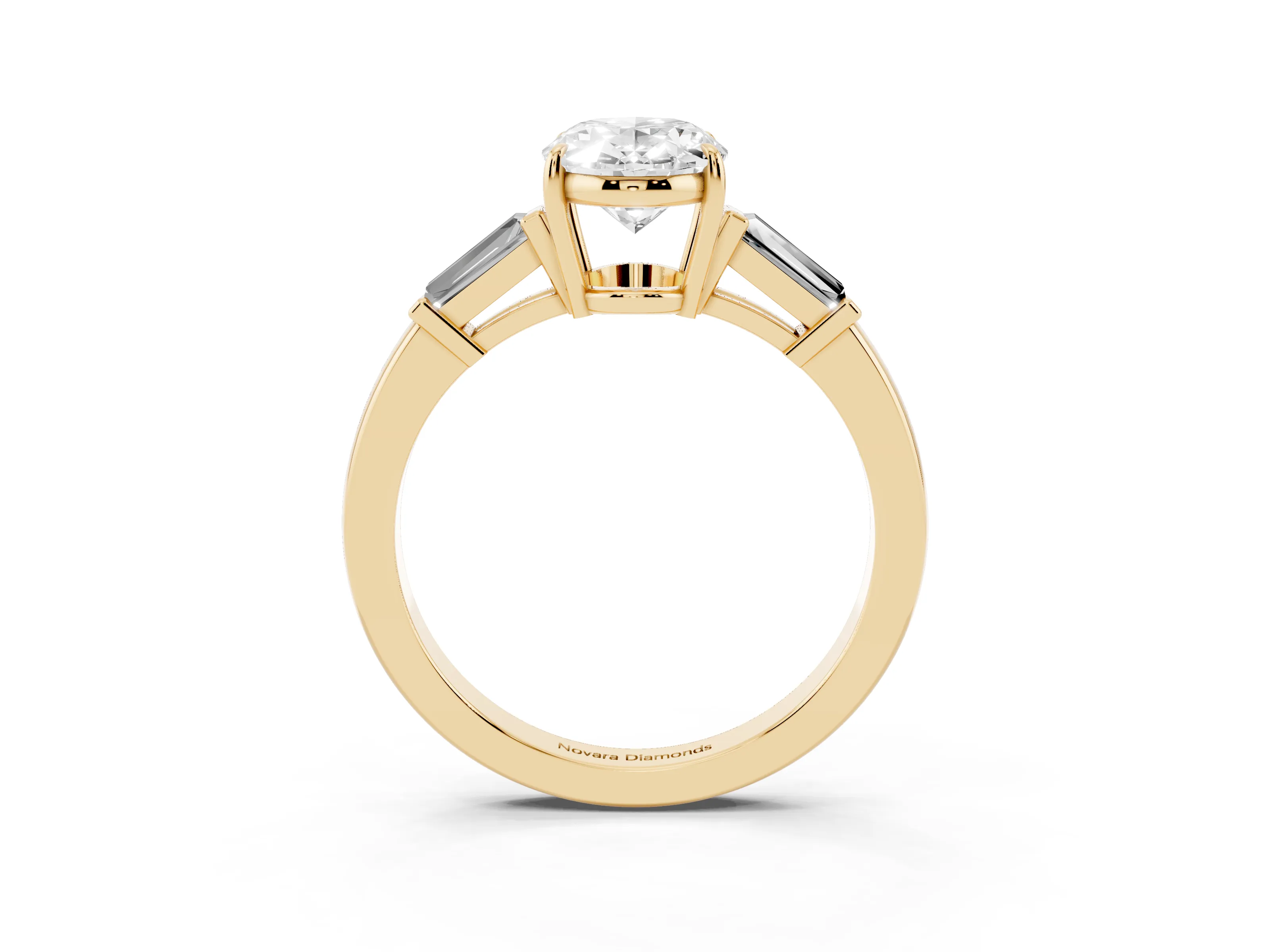 Oval Cut Diamond Three-Stone Ring Set in Yellow gold with Tapered Baguette Side Stones and Prong Setting