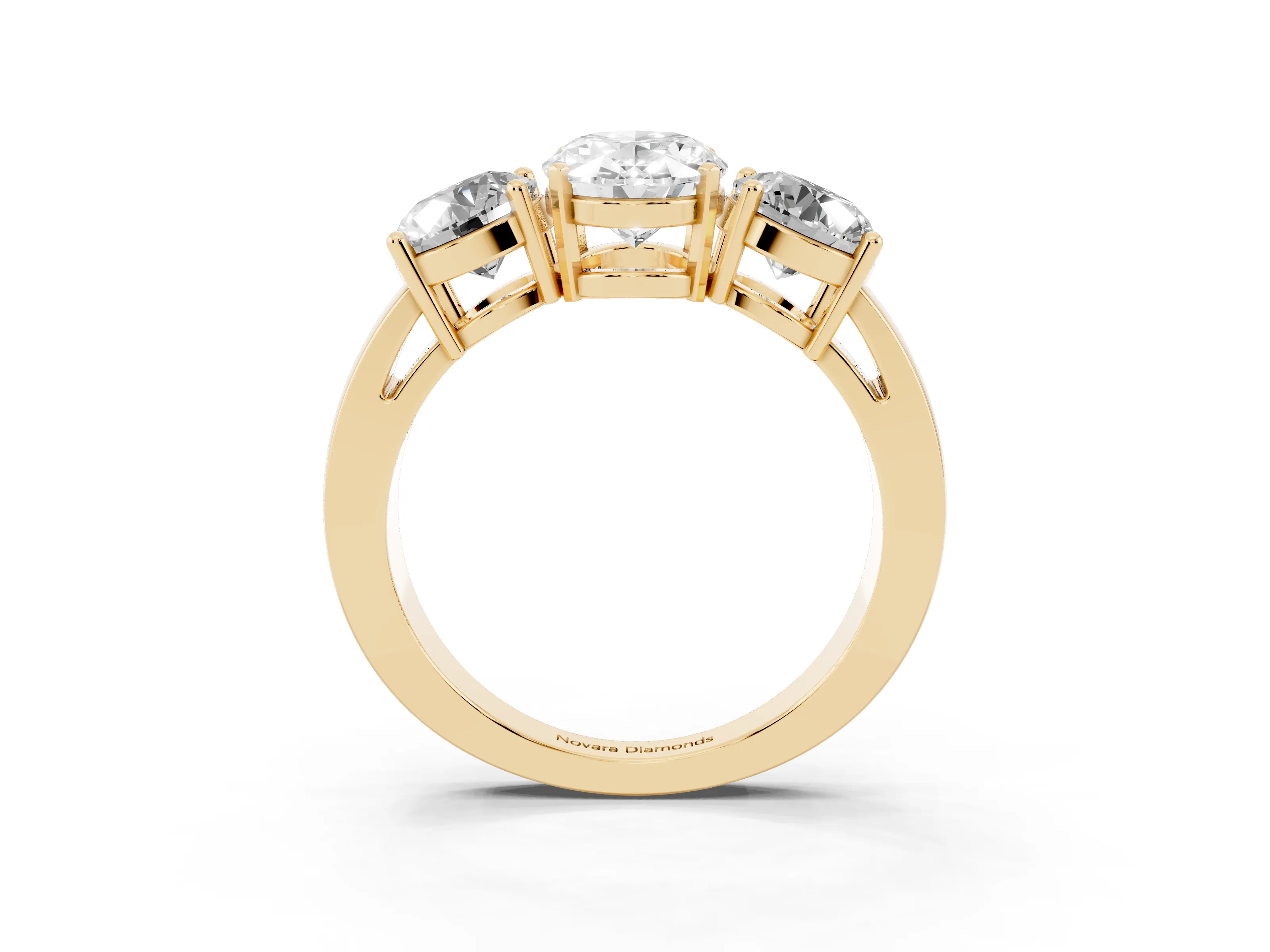Oval Cut Diamond Three-Stone Ring Set in Yellow gold with Round Side Stones and Classic Band
