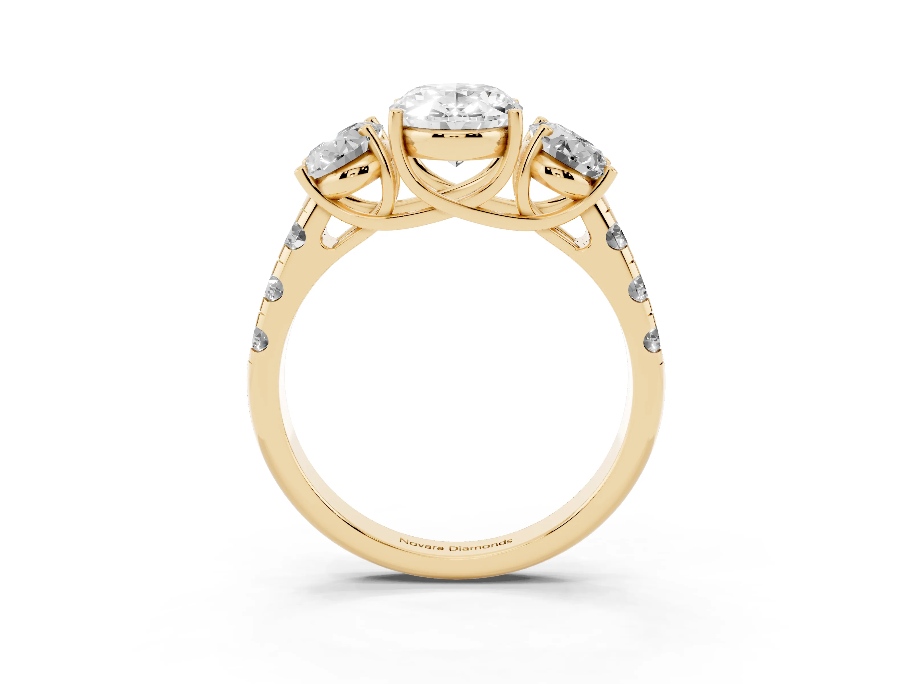 Oval Cut Diamond Three-Stone Ring Set in Yellow gold with Pavé Band