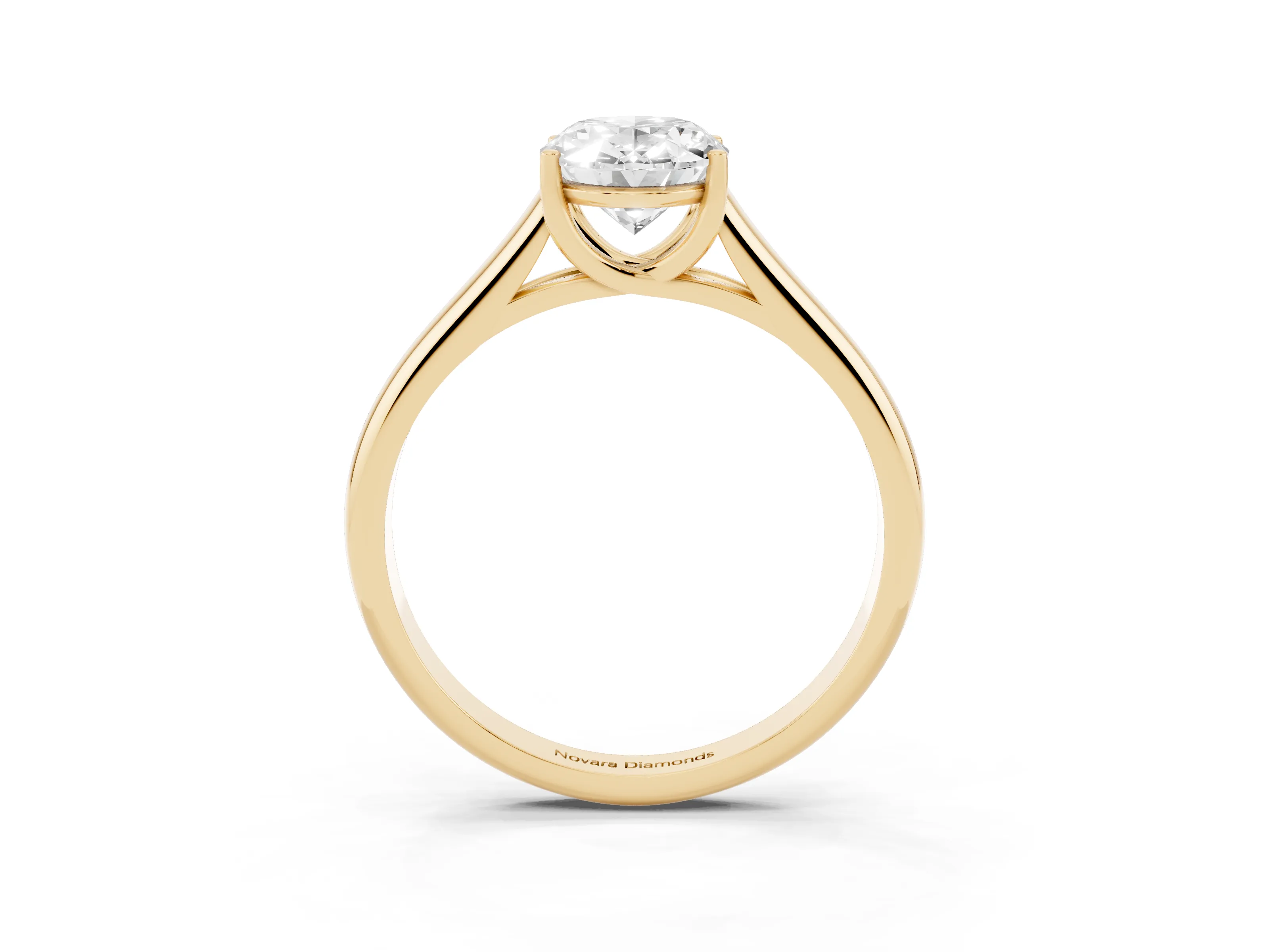Oval Cut Diamond Solitaire Engagement Ring Set in Yellow gold with Subtly Tapered Band and Prong Setting