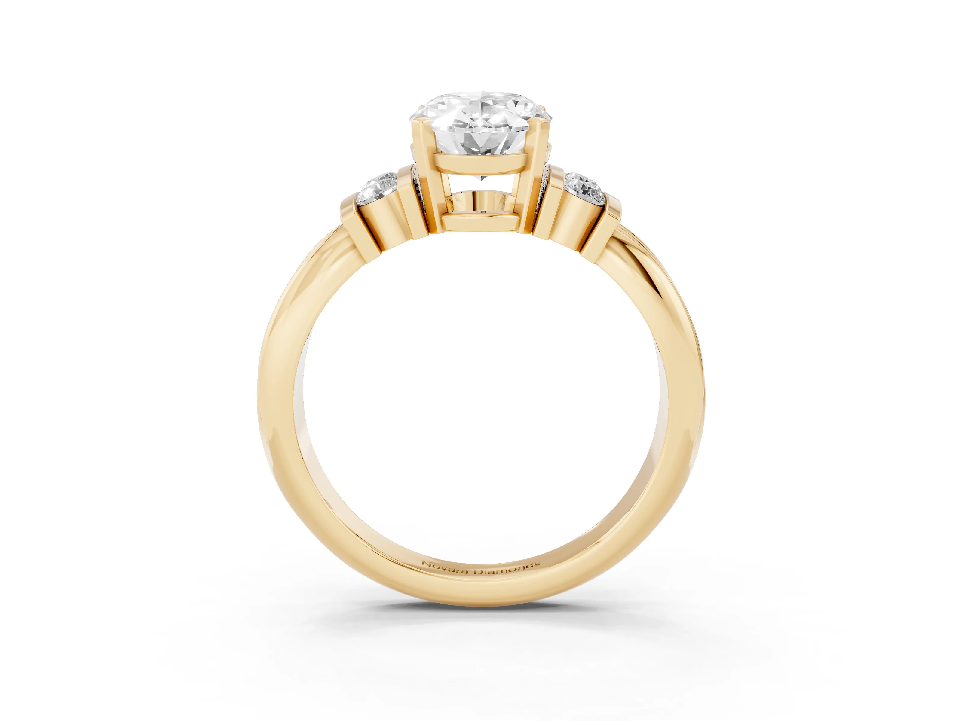 Three-Stone Oval Cut Diamond Channel Set Ring Set in Yellow gold with Bar Prongs