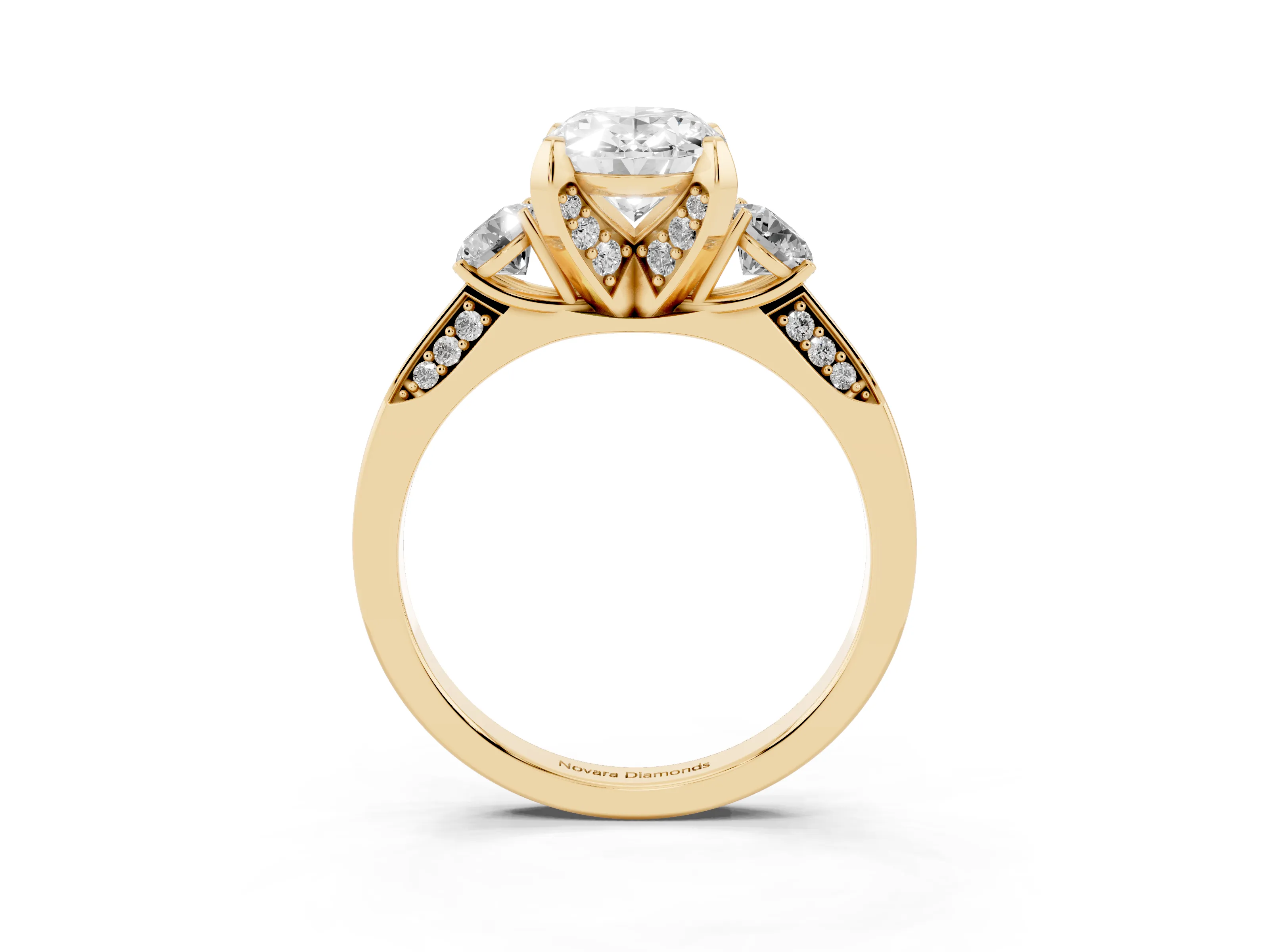Oval Cut Diamond Three-Stone Ring Set in Yellow gold with Pavé Band and Smaller Side Stones
