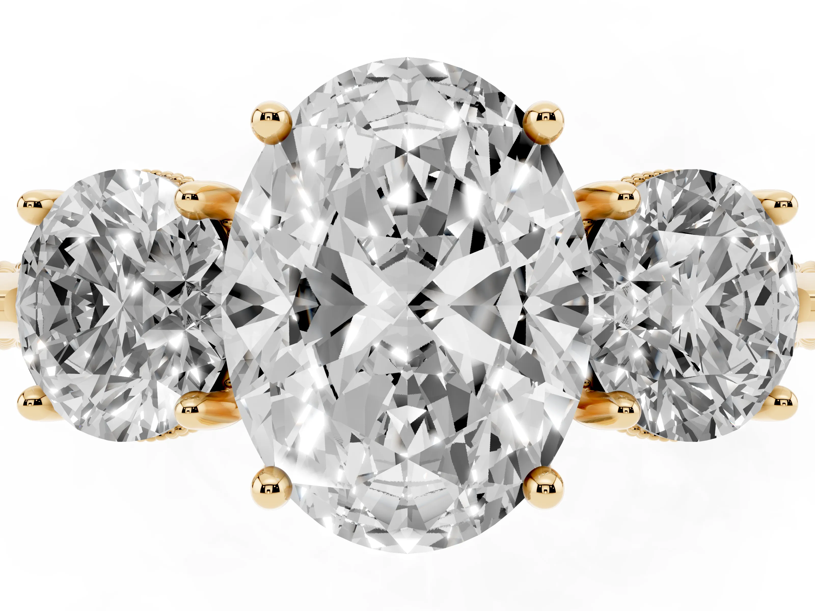 Oval Cut Diamond Three-Stone Ring Set in Yellow gold with Milgrain Band