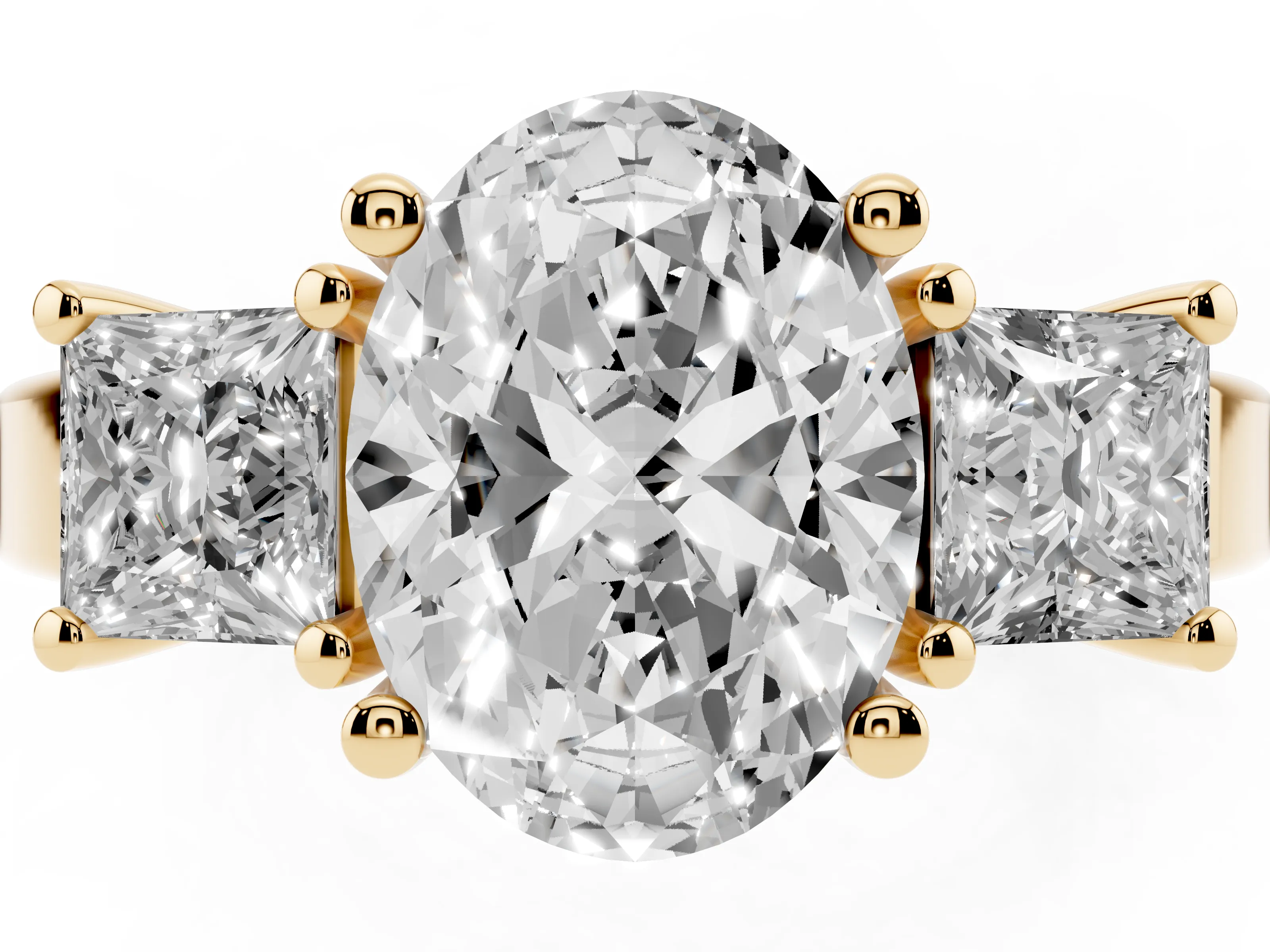 Three-Stone Oval Cut Diamond Solitaire Ring Set in Yellow gold with Prong Setting