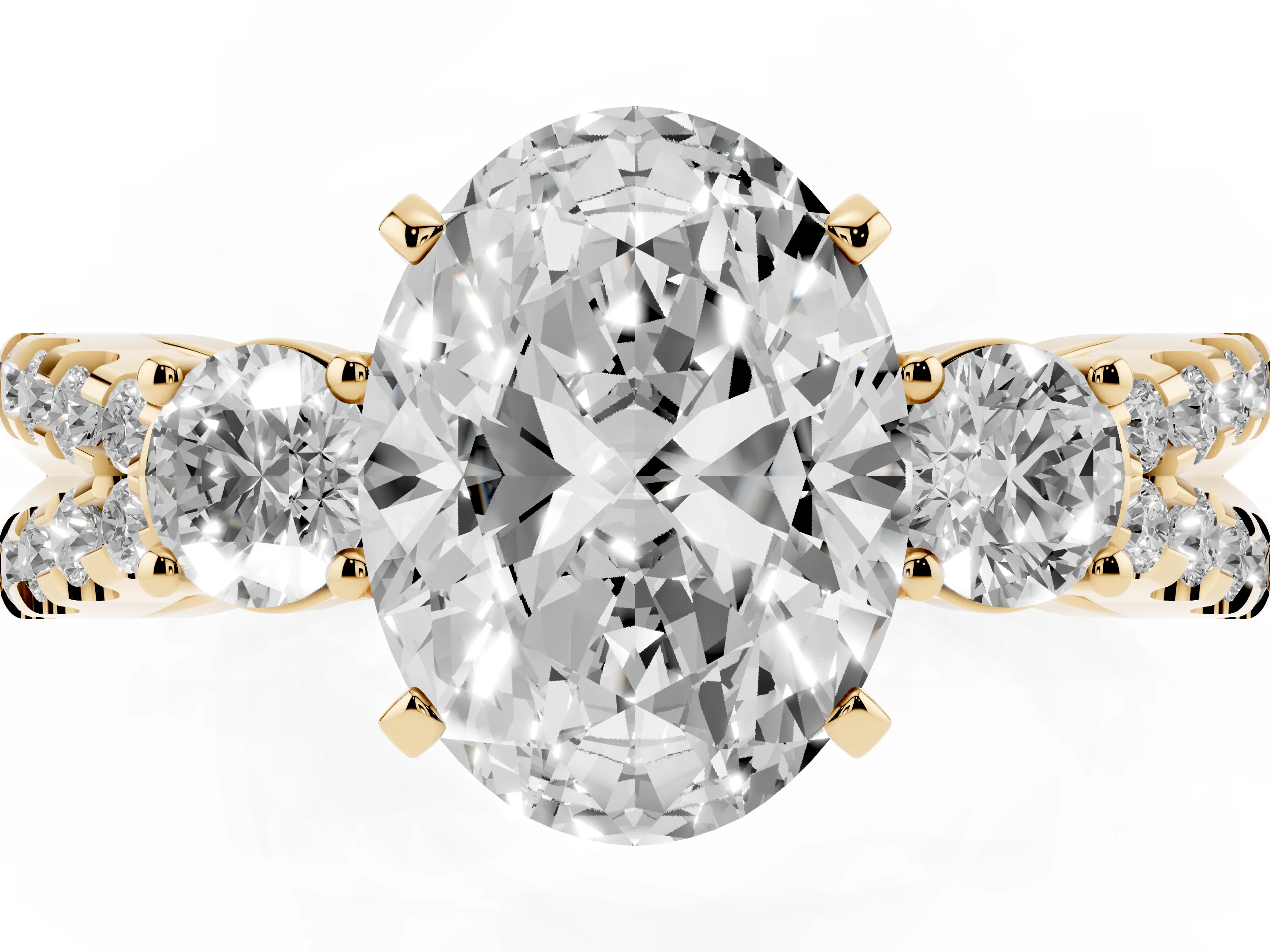 Oval Cut Diamond Three-Stone Ring Set in Yellow gold with Pavé Split Shank and Prong Setting