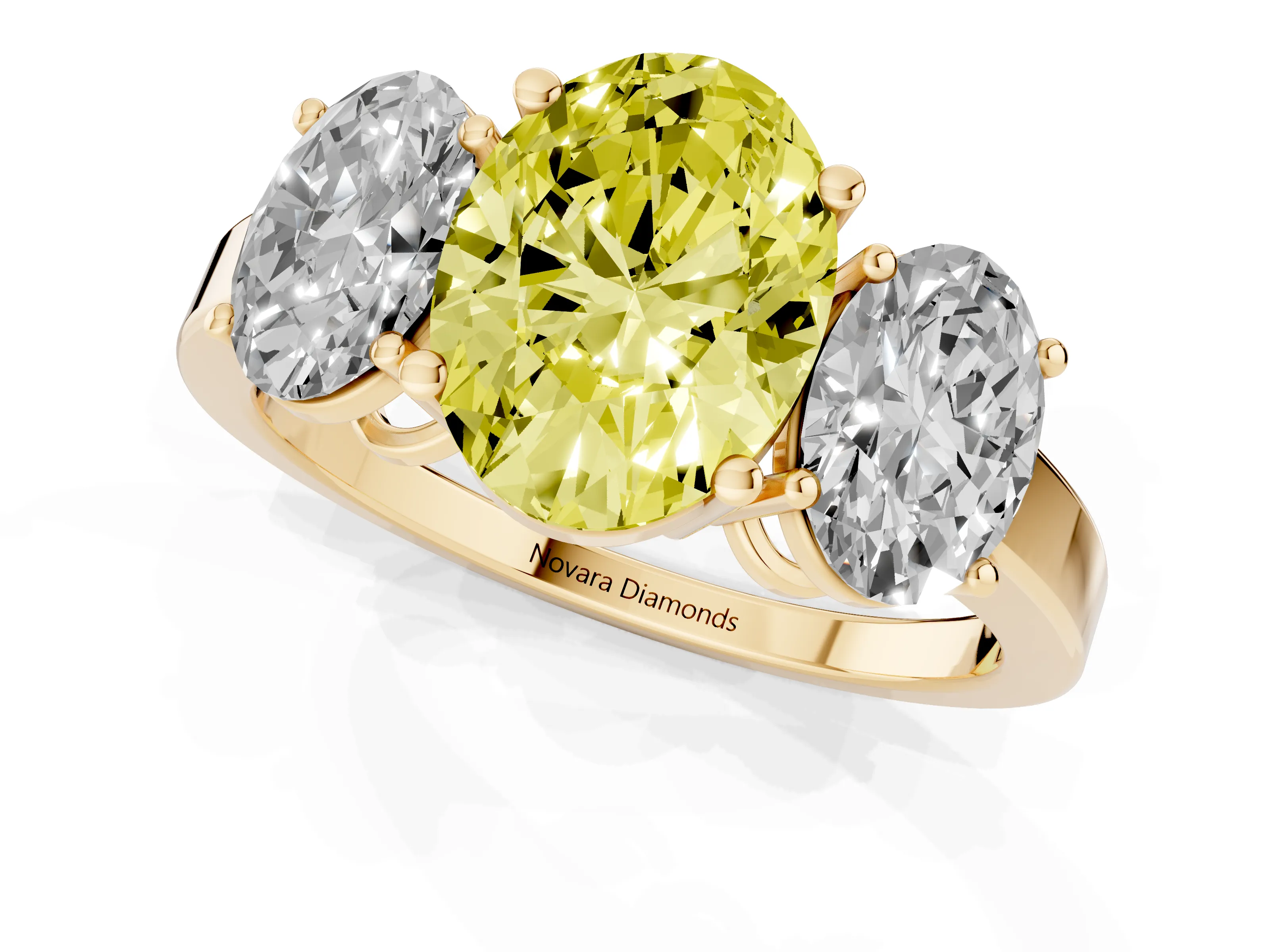 Fancy Yellow Oval Cut Diamond Three-Stone Engagement Ring Set in Yellow gold with Flat Band
