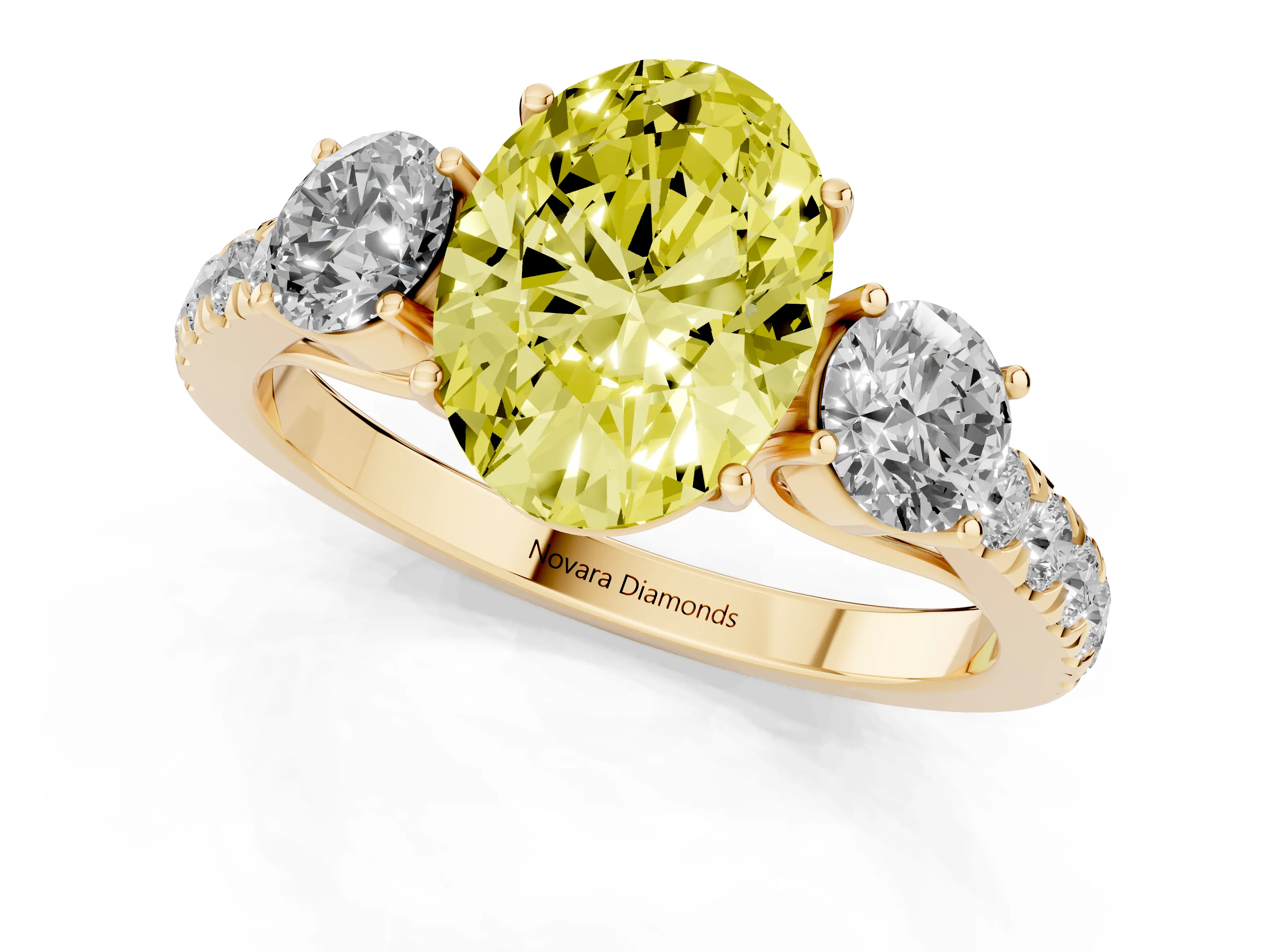 Fancy Yellow Oval Cut Diamond Three-Stone Ring Set in Yellow gold with Round Side Stones and Delicate Pavé Band