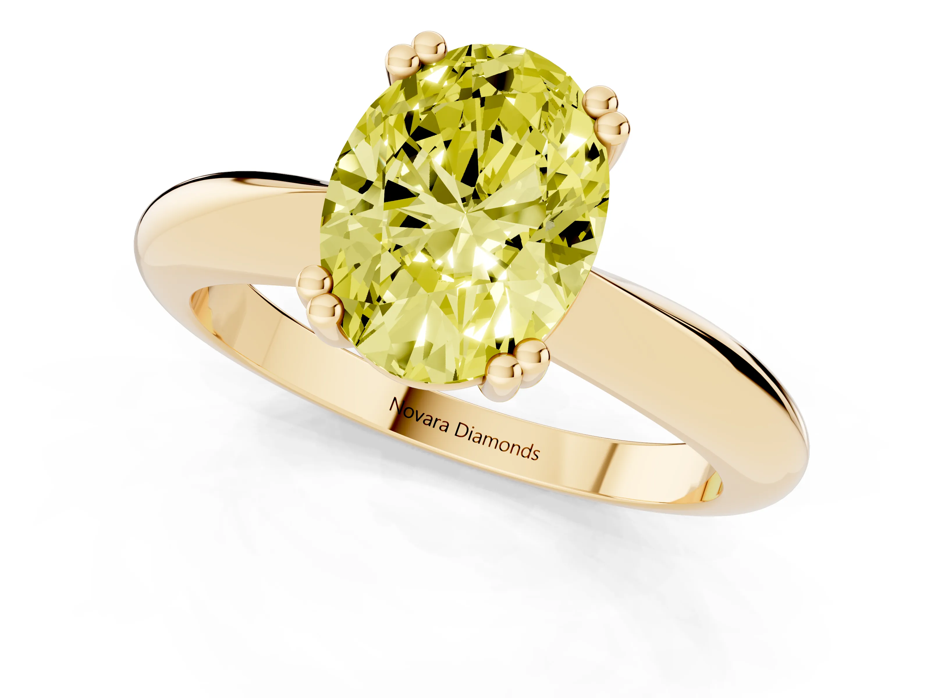 Fancy Yellow Oval Cut Diamond Solitaire Engagement Ring Set in Yellow gold with Tapered Band and Prong Setting