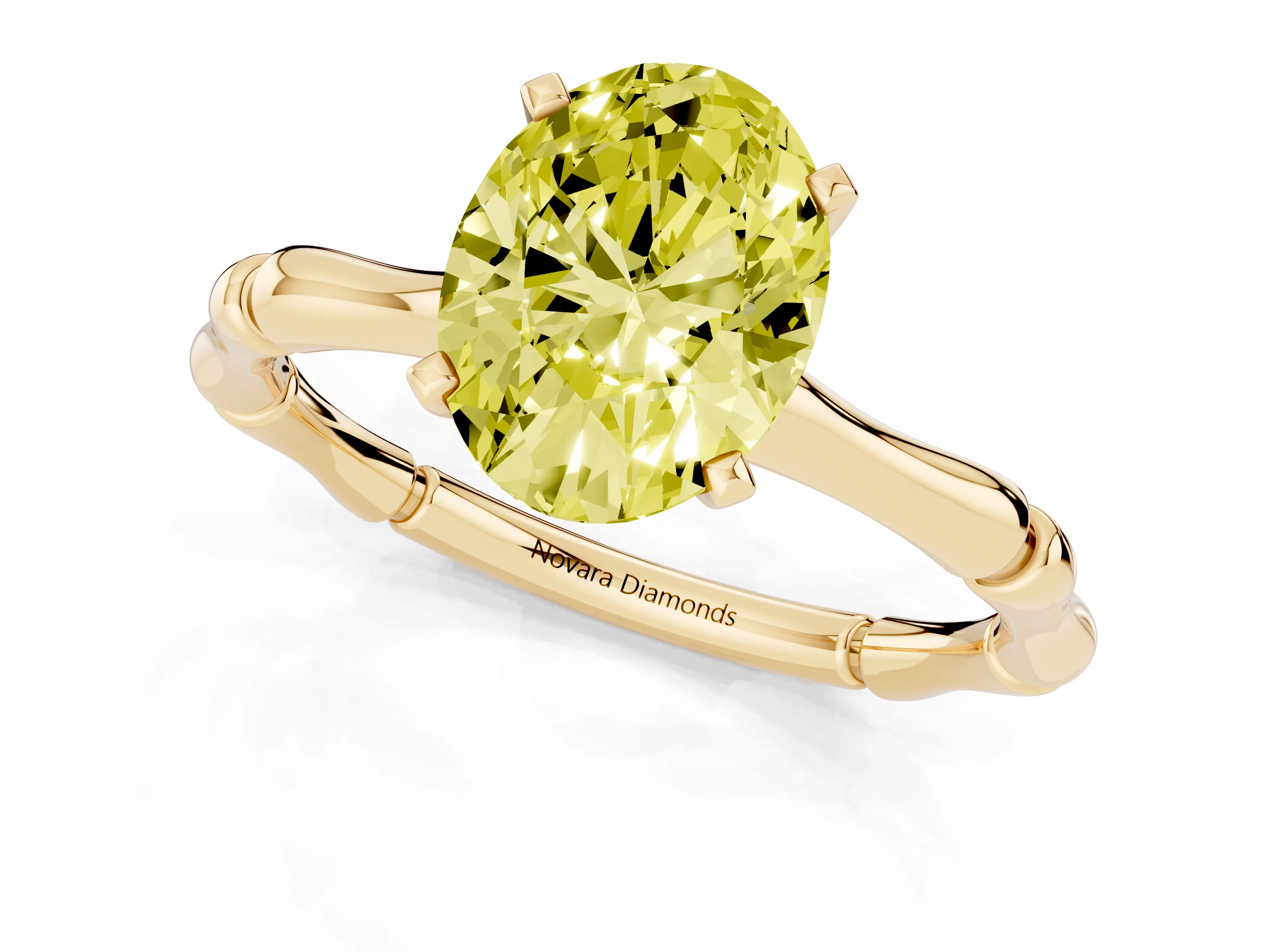 Fancy Yellow Oval Cut Diamond Solitaire Ring Set in Yellow gold with Bamboo Band and Prong Setting