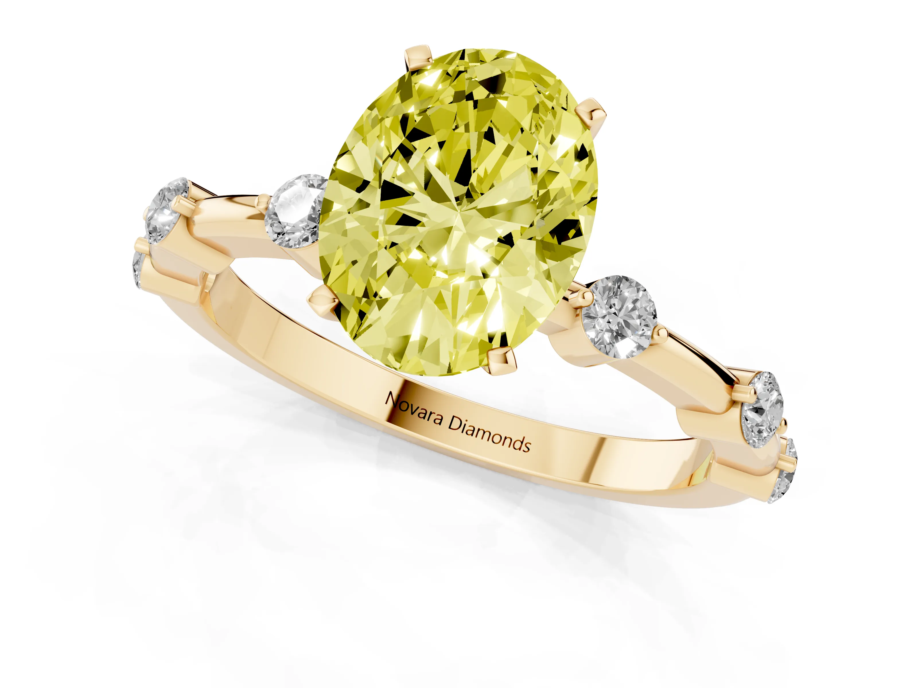 Fancy Yellow Oval Cut Diamond Solitaire Ring Set in Yellow gold with Bezel Set Side Stones and Prong Setting