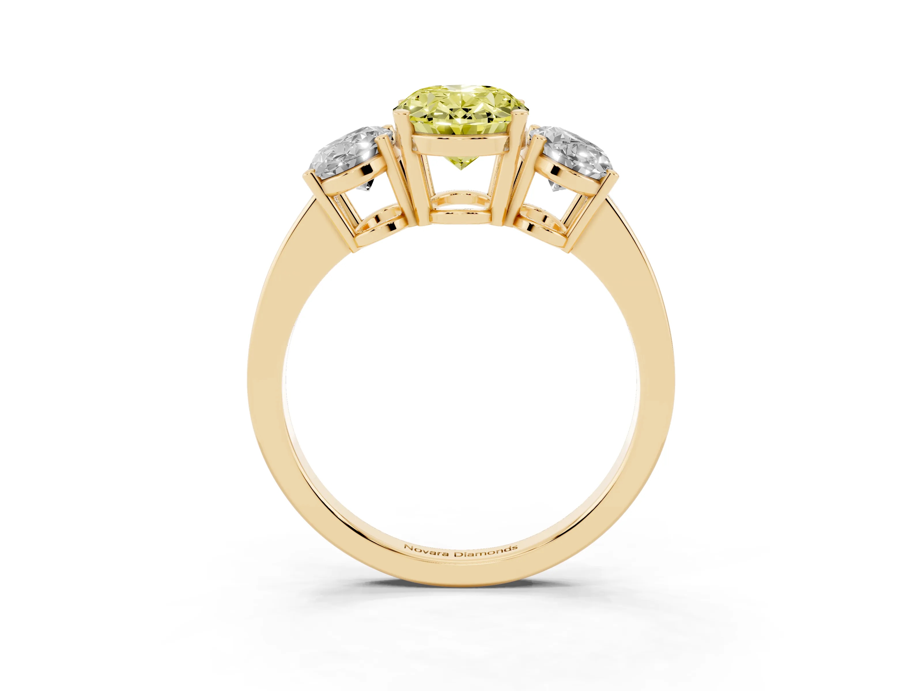 Fancy Yellow Oval Cut Diamond Three-Stone Engagement Ring Set in Yellow gold with Flat Band