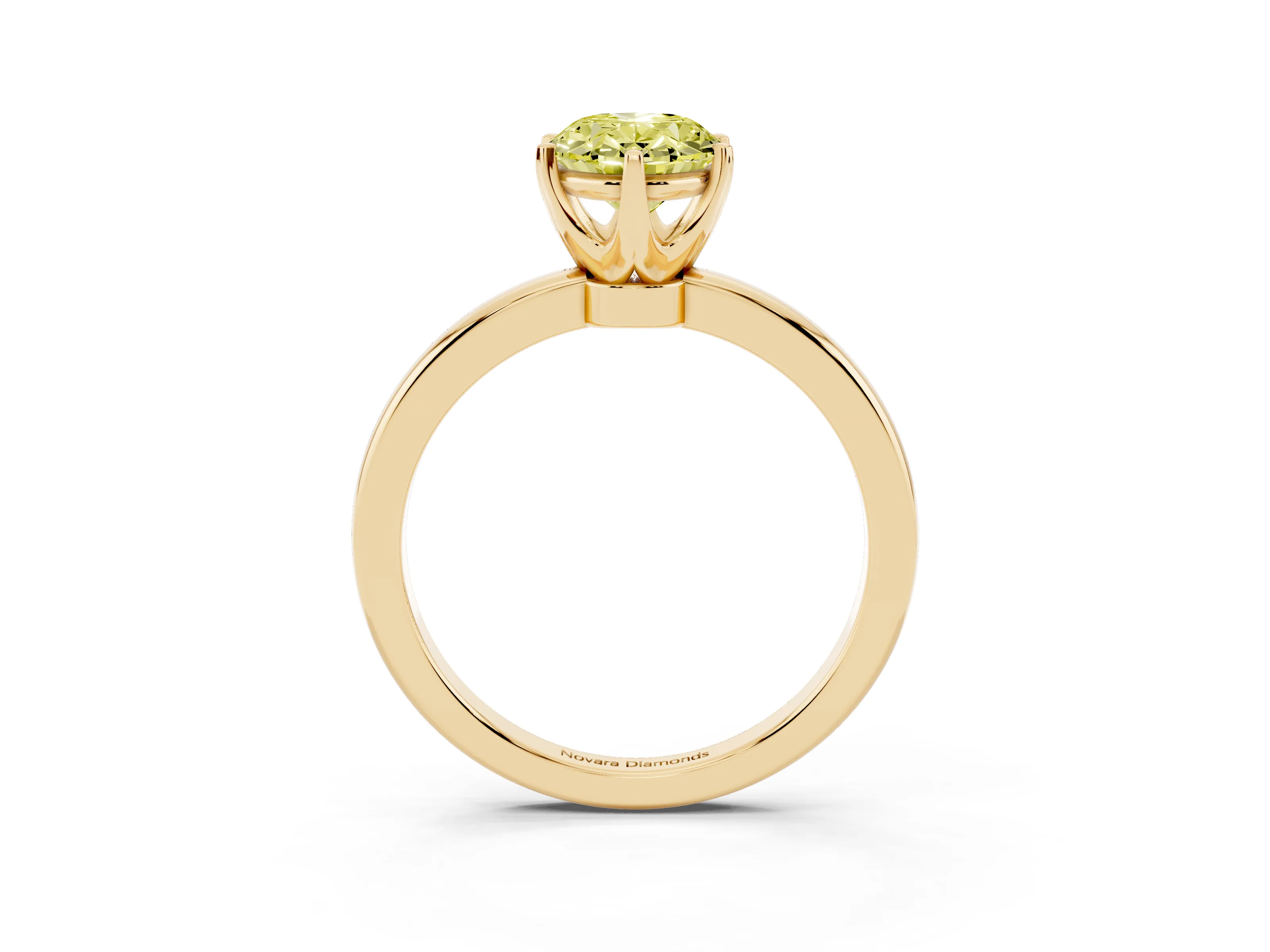 Fancy Yellow Oval Cut Diamond Solitaire Ring Set in Yellow gold with Raised Prong Setting on a Classic Band