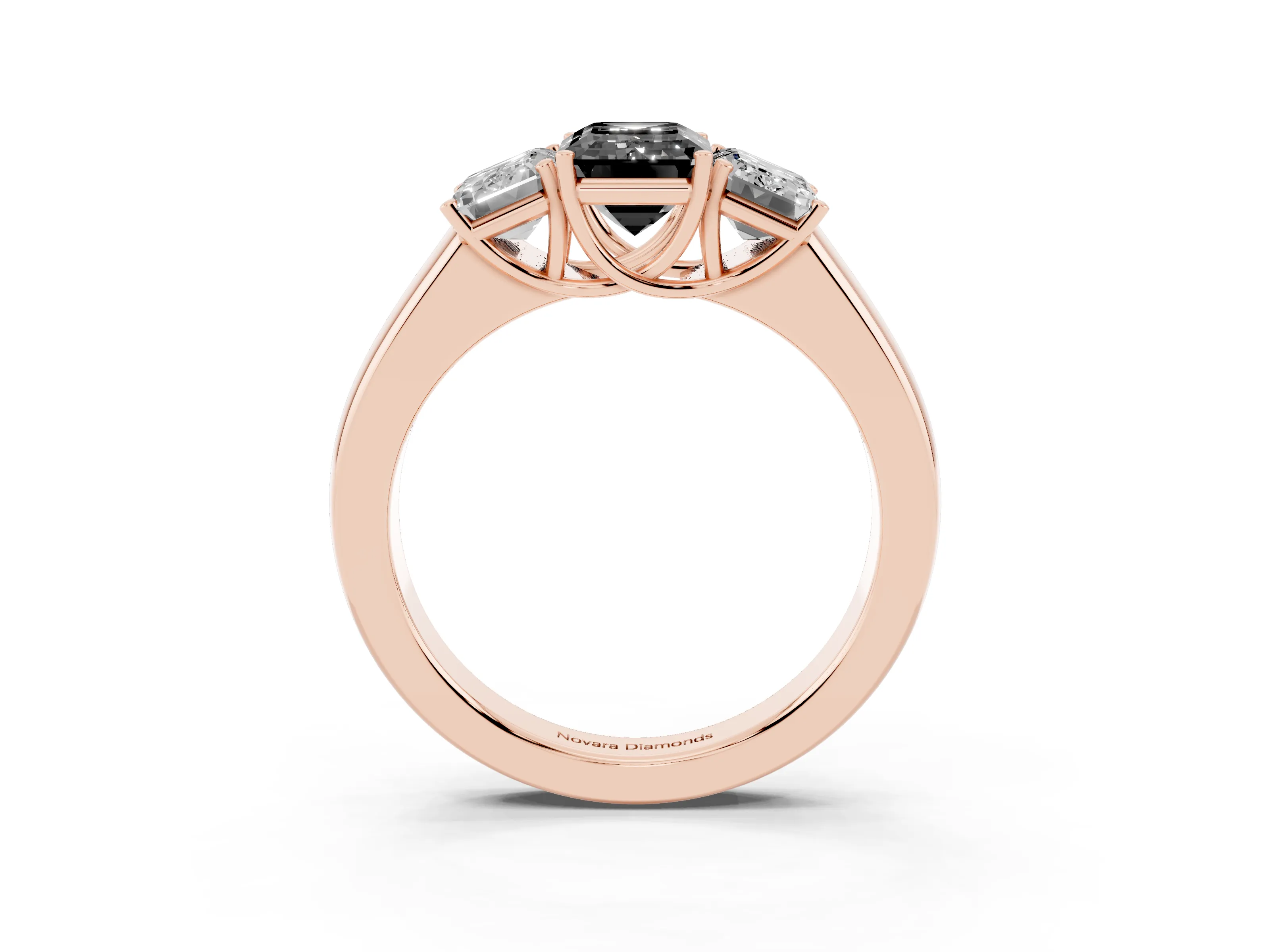 Fancy Black Three-Stone Emerald Cut Diamond Ring Set in Rose gold with Matching Prong Settings and Plain Band
