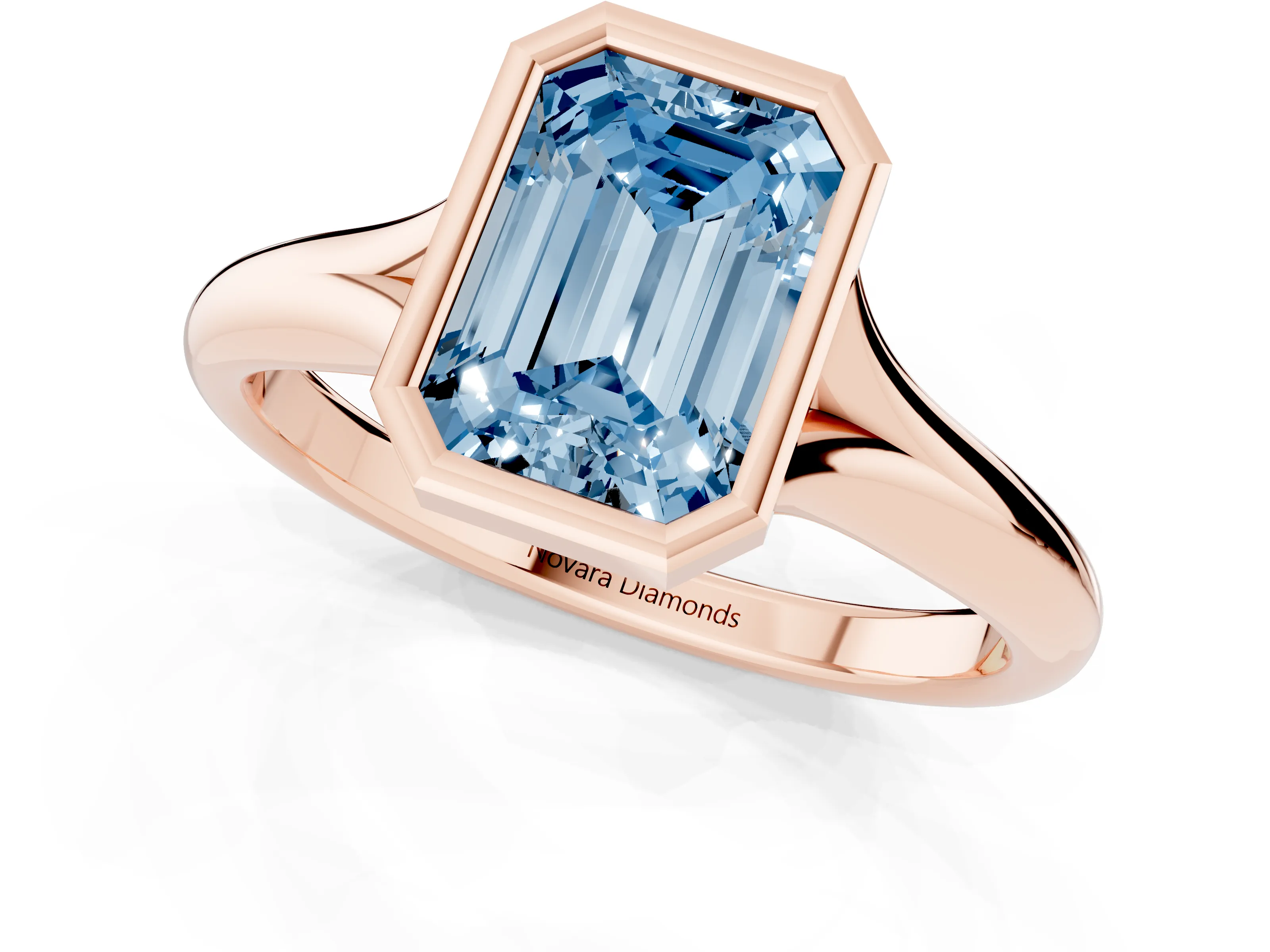 Fancy Blue Bezel Set Emerald Cut Diamond Solitaire Ring Set in Rose gold with Smooth Band