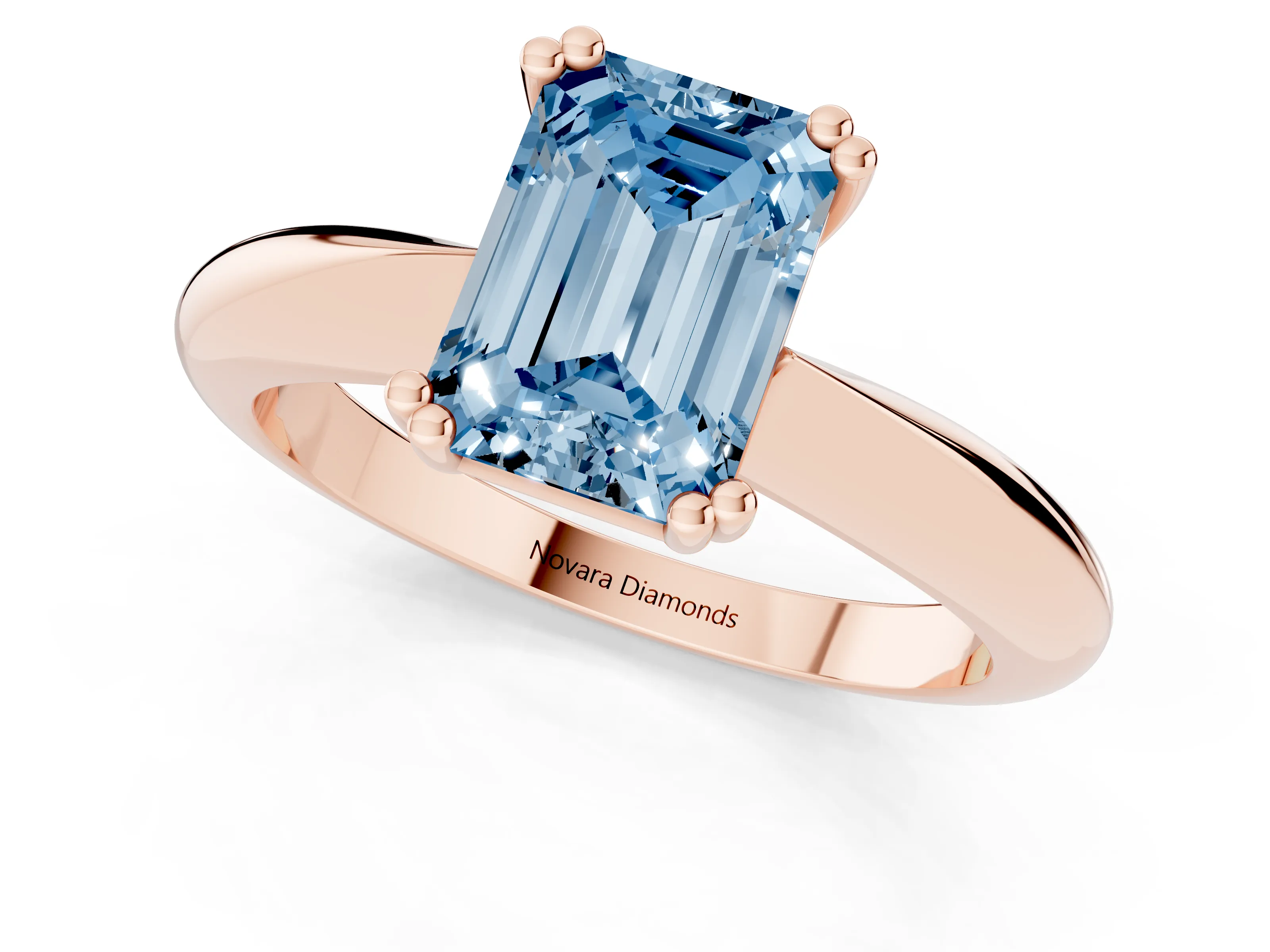 Fancy Blue Emerald Cut Diamond Solitaire Engagement Ring Set in Rose gold with Tapered Band and Prong Setting