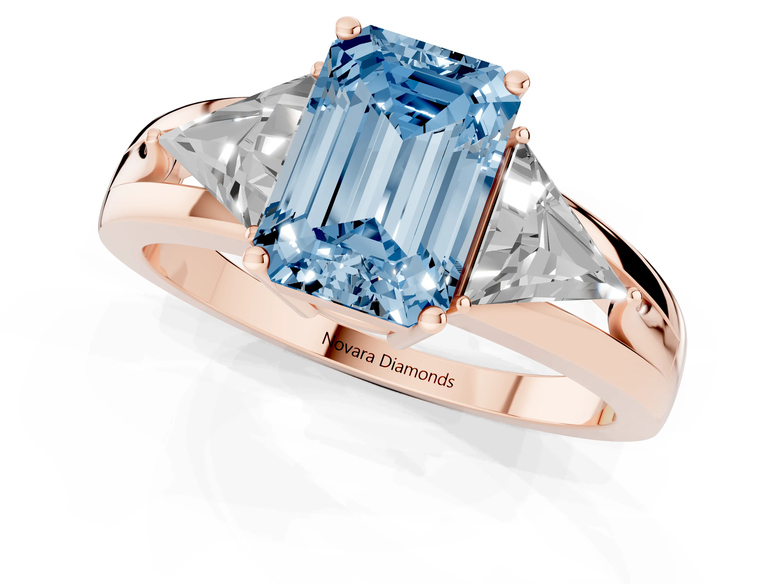 Fancy Blue Emerald Cut Diamond Three-Stone Ring Set in Rose gold with Trillion Side Stones and Split Shank