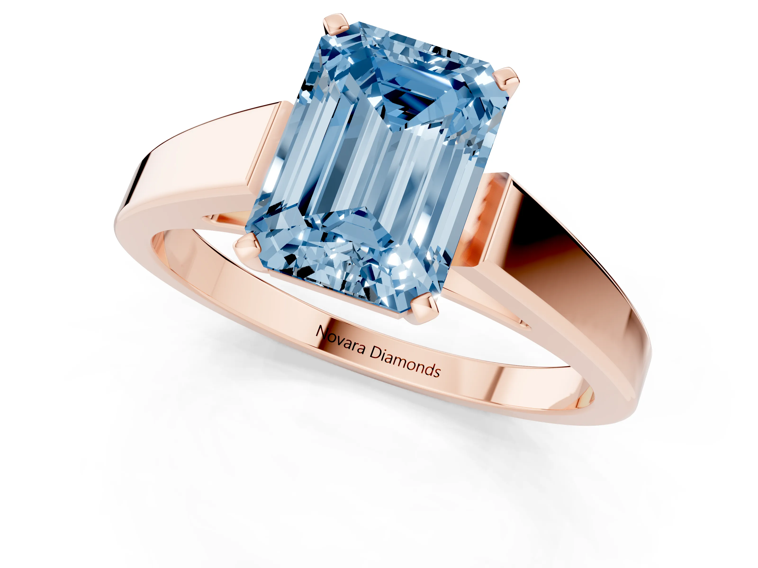 Fancy Blue Emerald Cut Diamond Solitaire Engagement Ring Set in Rose gold with Prong Setting and Tapered Band