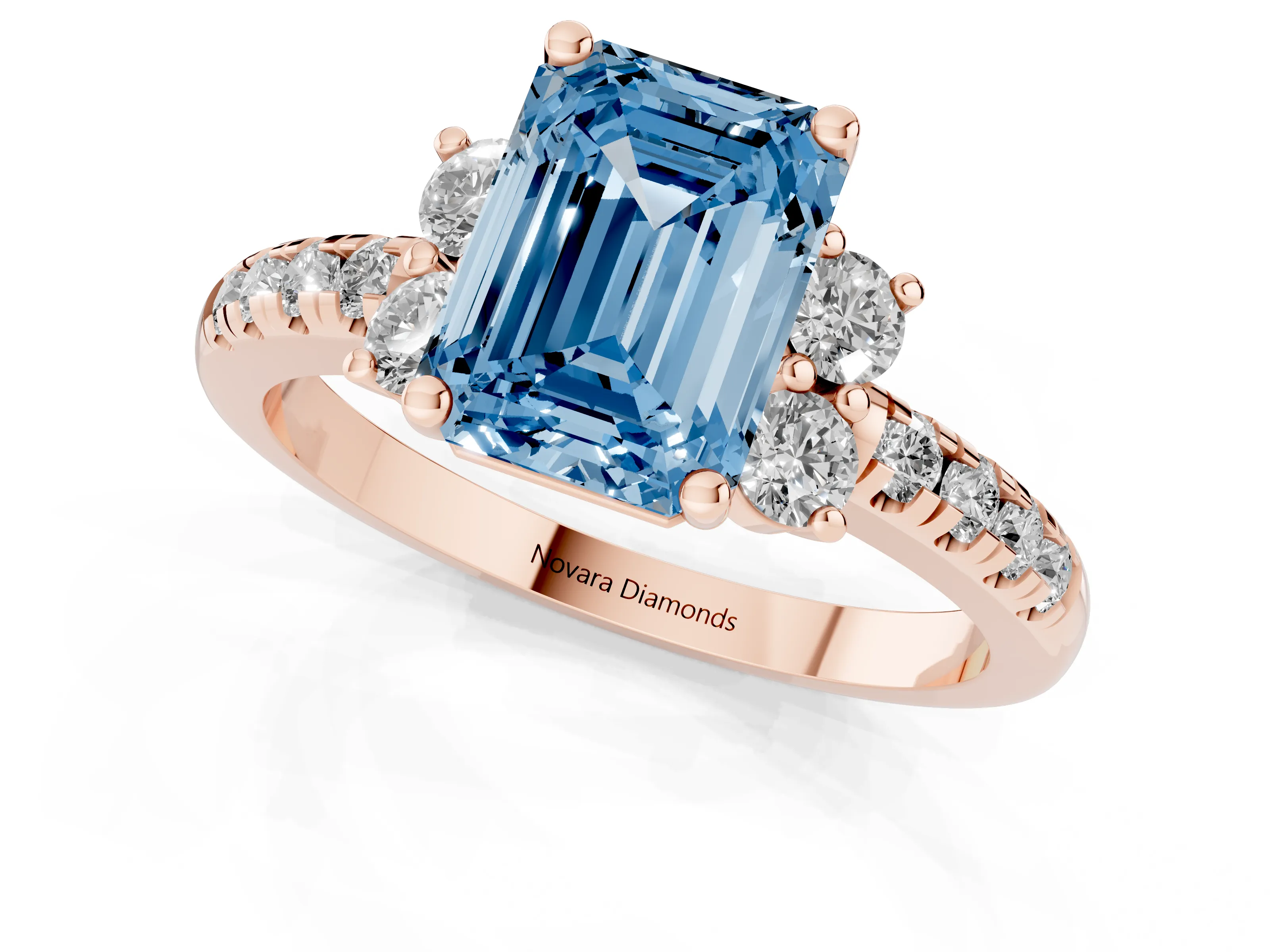 Fancy Blue Emerald Cut Diamond Three-Stone Pavé Ring Set in Rose gold with Prong Setting