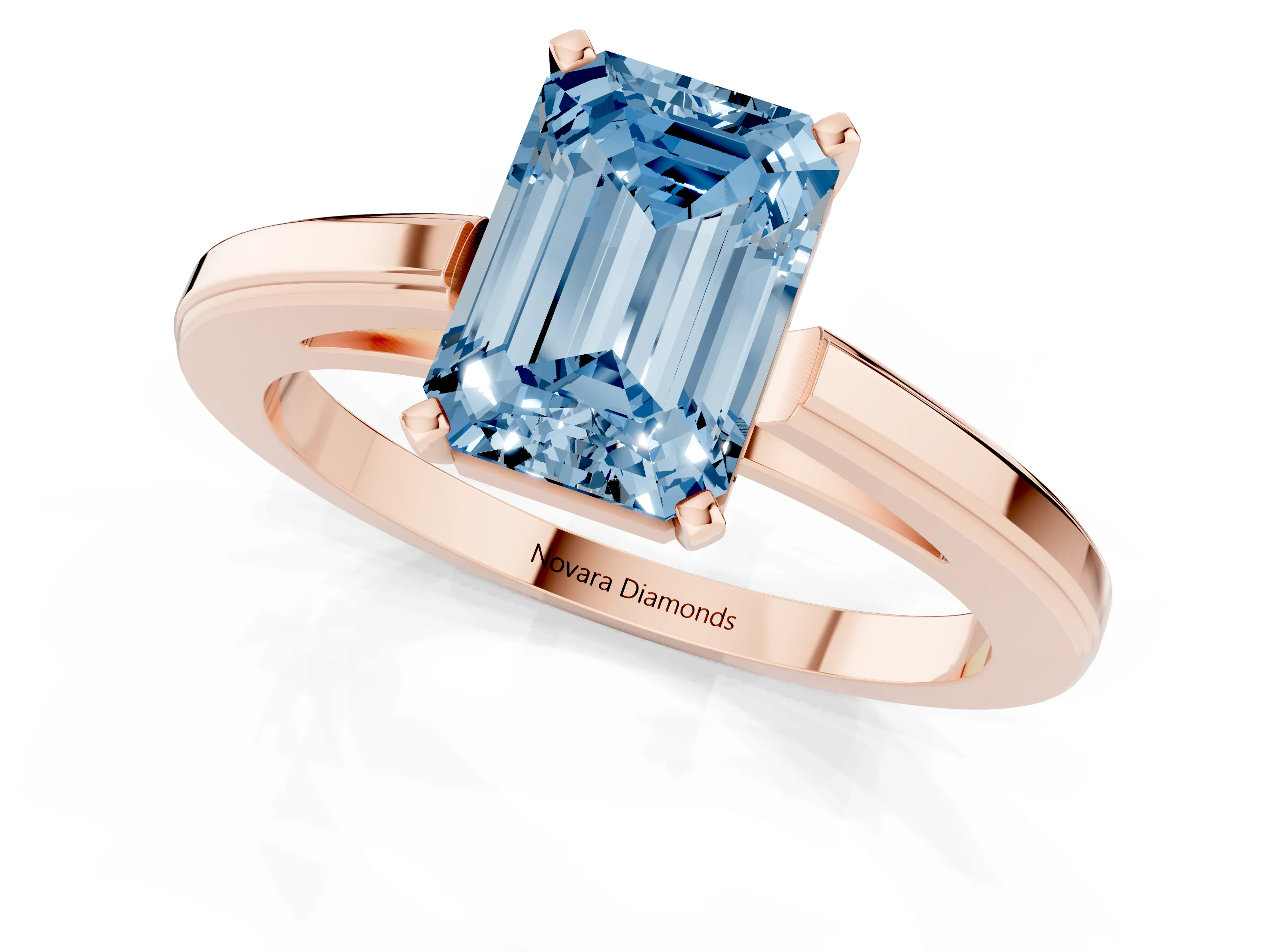 Fancy Blue Emerald Cut Diamond Solitaire Ring Set in Rose gold with Prong Setting and Classic Band