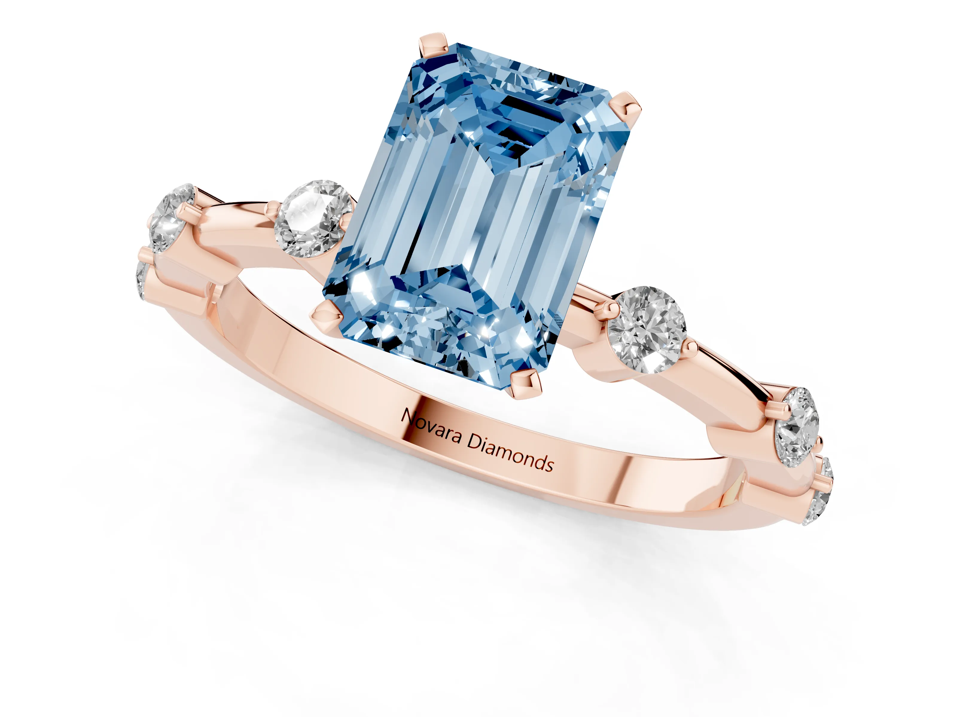 Fancy Blue Emerald Cut Diamond Solitaire Ring Set in Rose gold with Bezel Set Side Stones and Prong Setting