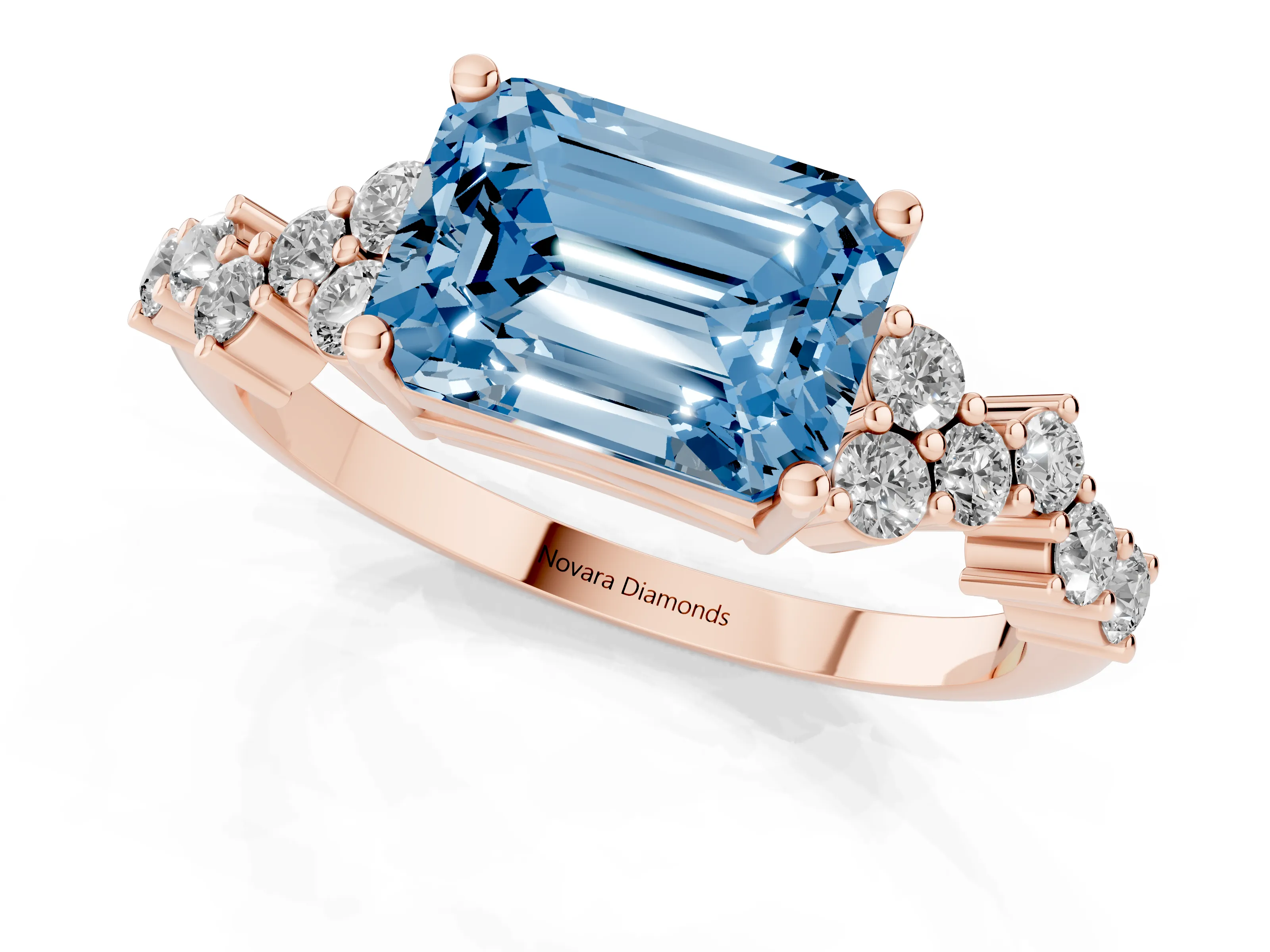 Fancy Blue Emerald Cut Diamond Ring Set in Rose gold with Scattered Round Accents