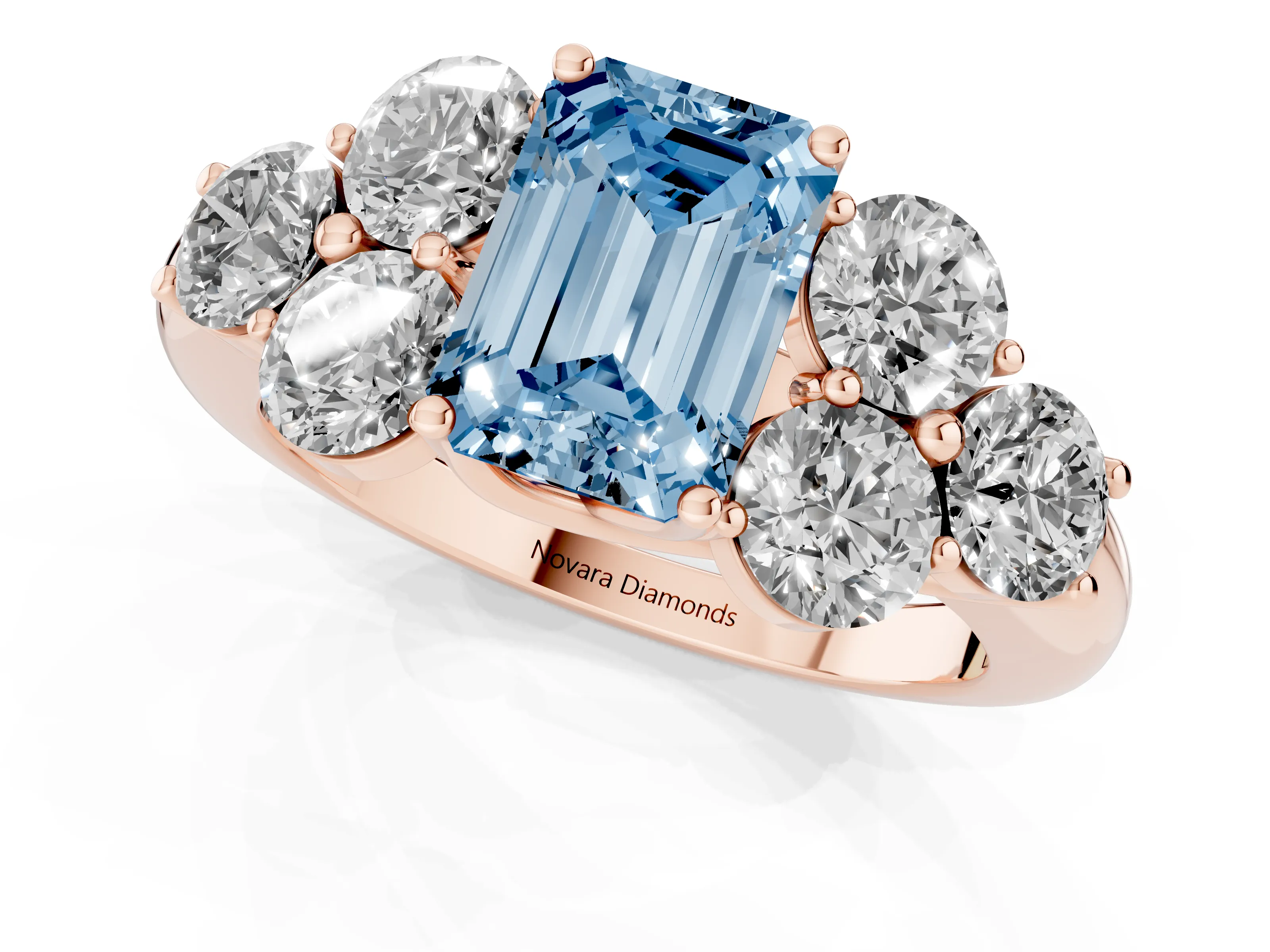 Fancy Blue Emerald Cut Diamond Cluster Ring Set in Rose gold with Round Accent Stones and Prong Setting on a Plain Band