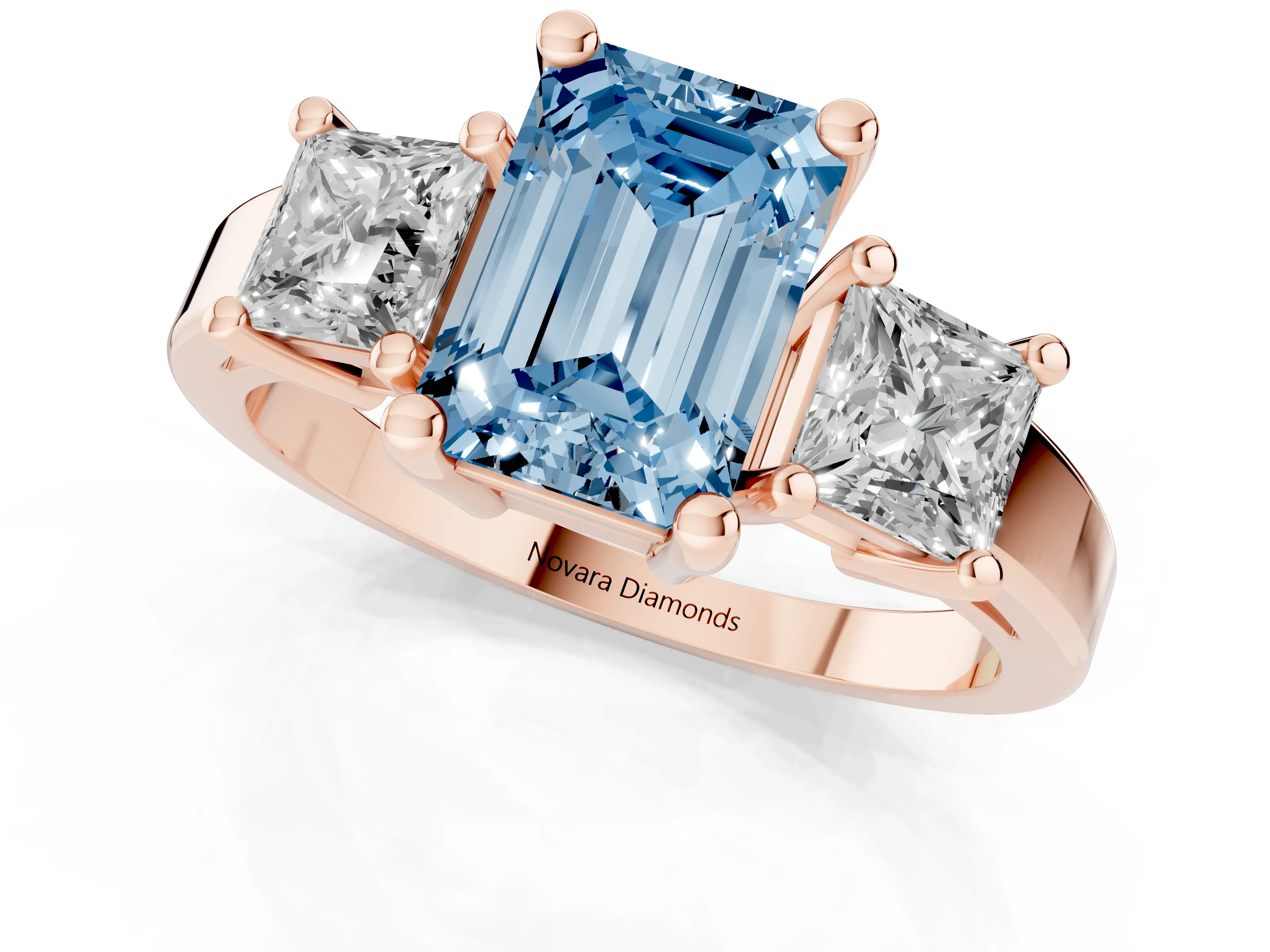 Fancy Blue Three-Stone Emerald Cut Diamond Solitaire Ring Set in Rose gold with Prong Setting
