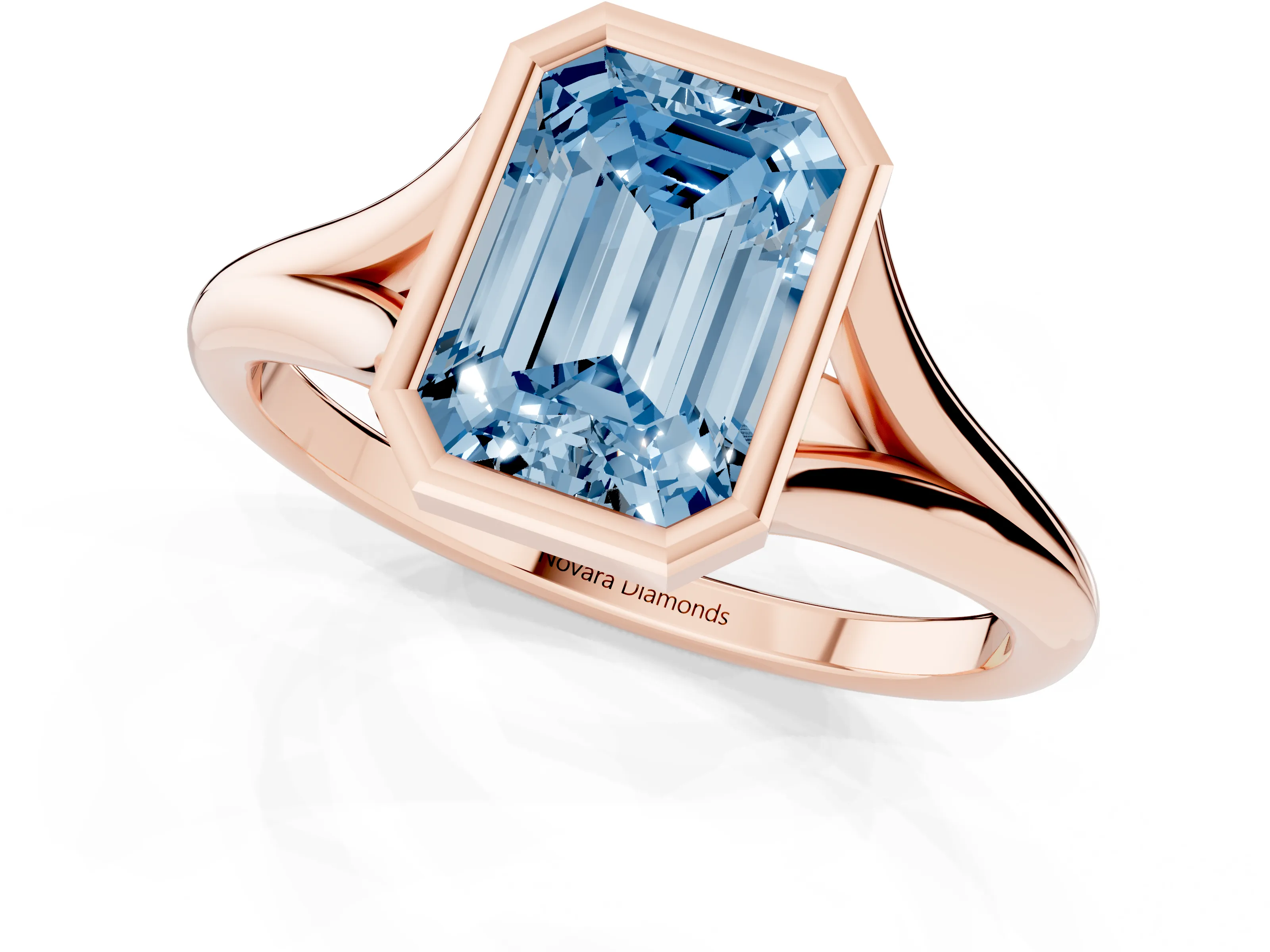 Fancy Blue Bezel Set Emerald Cut Diamond Solitaire Ring Set in Rose gold with Tapered Band