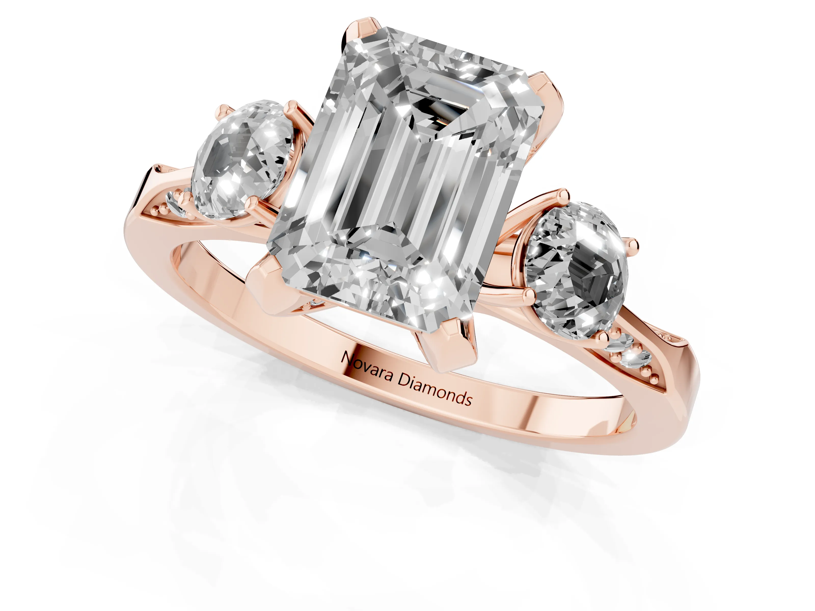 Fancy Blue Emerald Cut Diamond Three-Stone Ring Set in Rose gold with Pavé Band and Smaller Side Stones