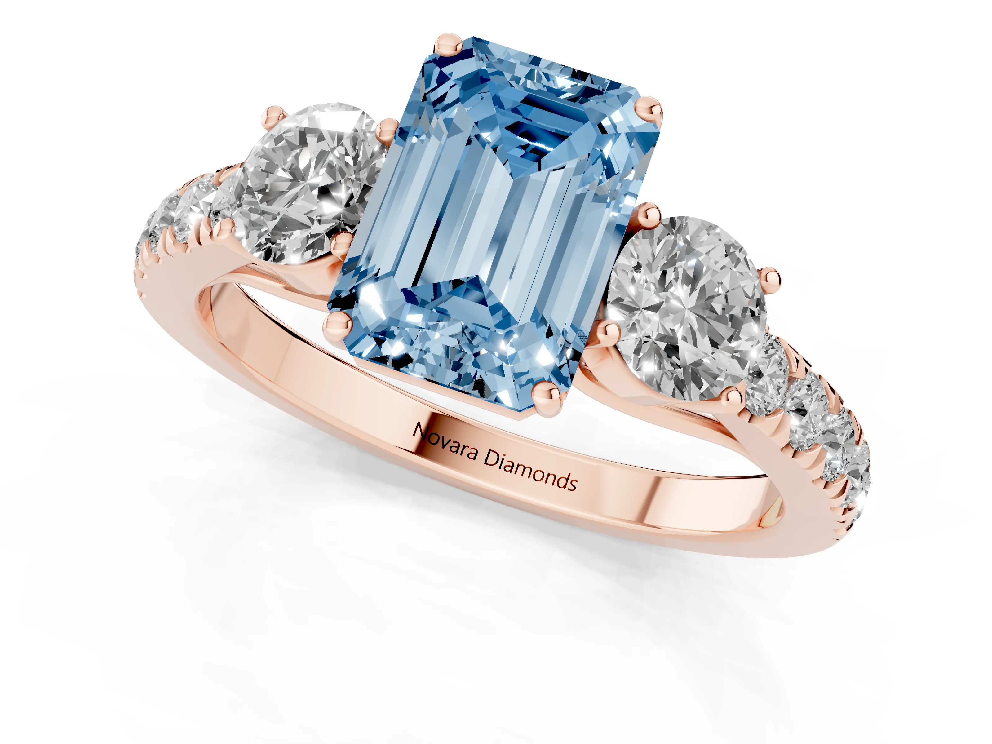Fancy Blue Emerald Cut Diamond Three-Stone Ring Set in Rose gold with Round Side Stones and Delicate Pavé Band