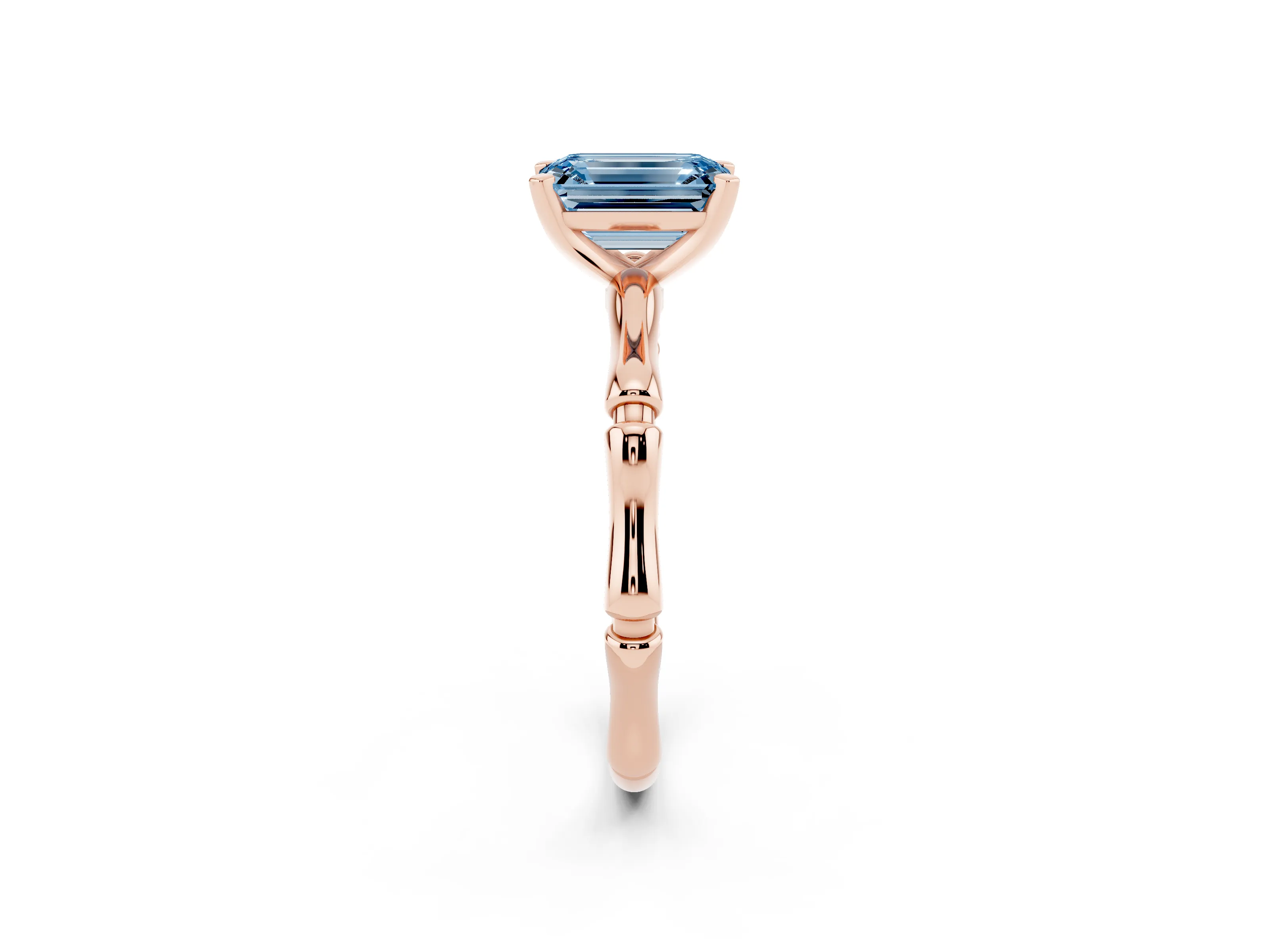 Fancy Blue Emerald Cut Diamond Solitaire Ring Set in Rose gold with Bamboo Band and Prong Setting